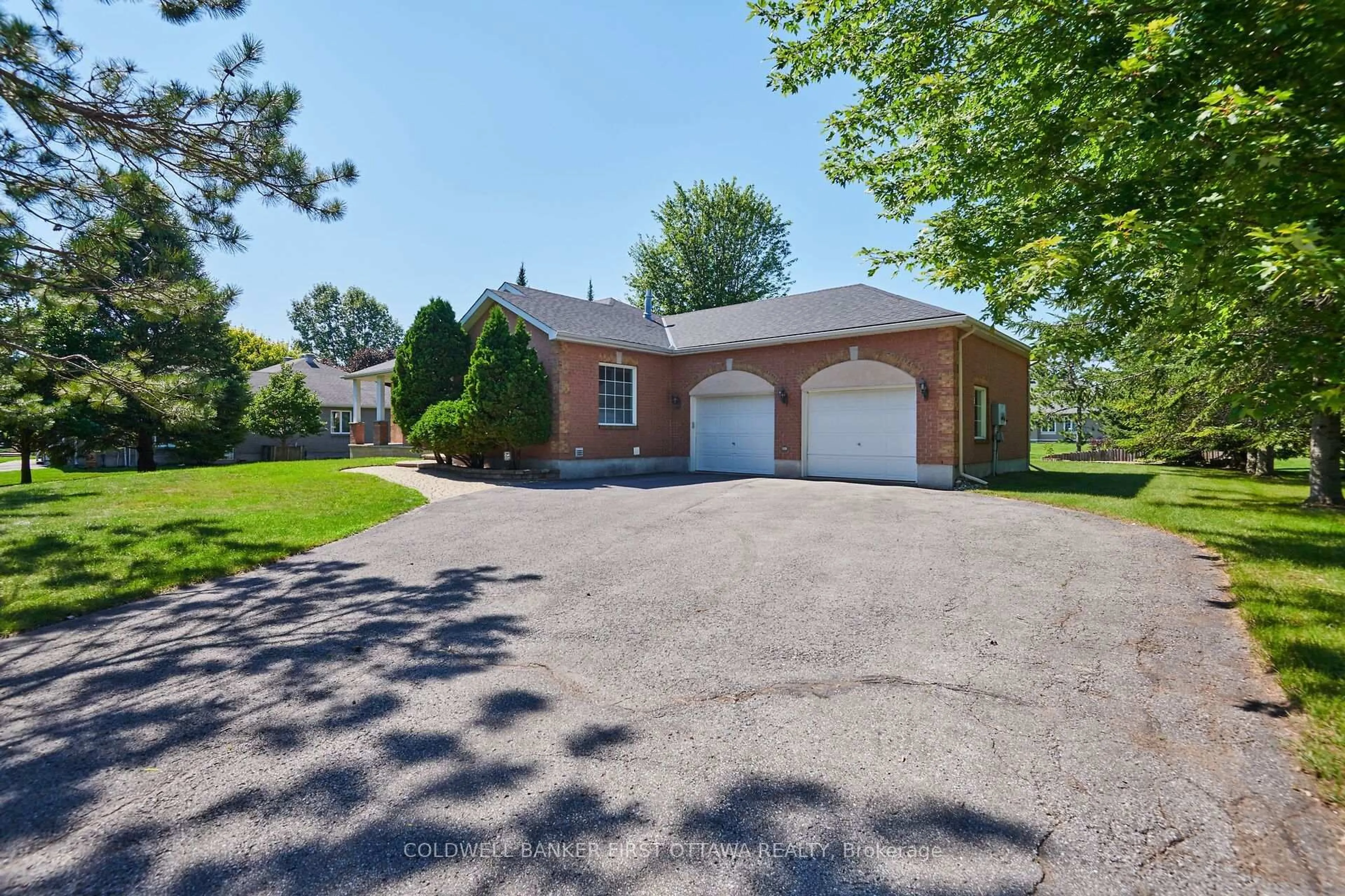 Home with brick exterior material, street for 6983 Lakes Park Dr, Greely Ontario K4P 1M6