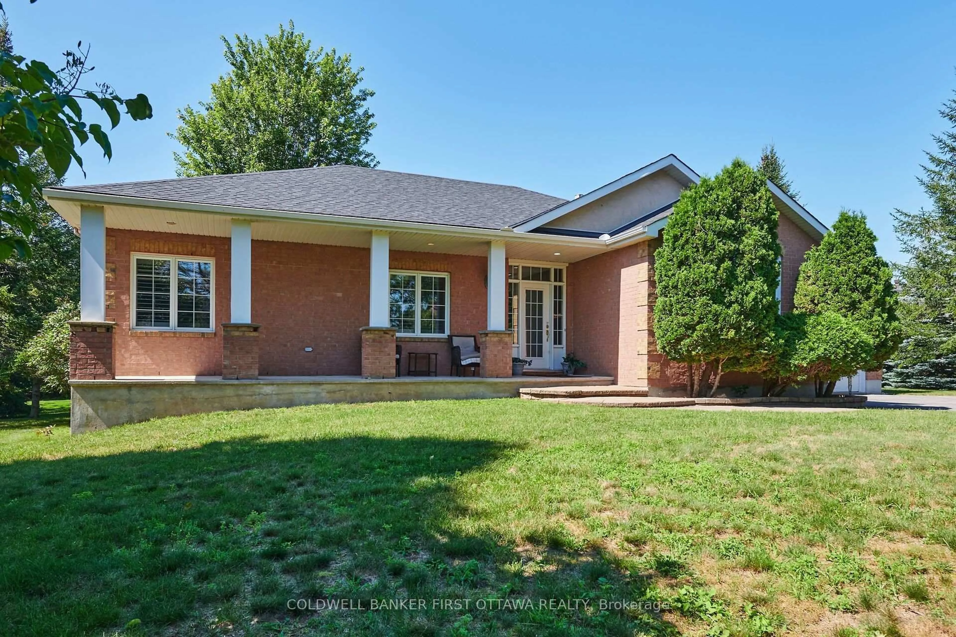 Home with brick exterior material, street for 6983 Lakes Park Dr, Greely Ontario K4P 1M6