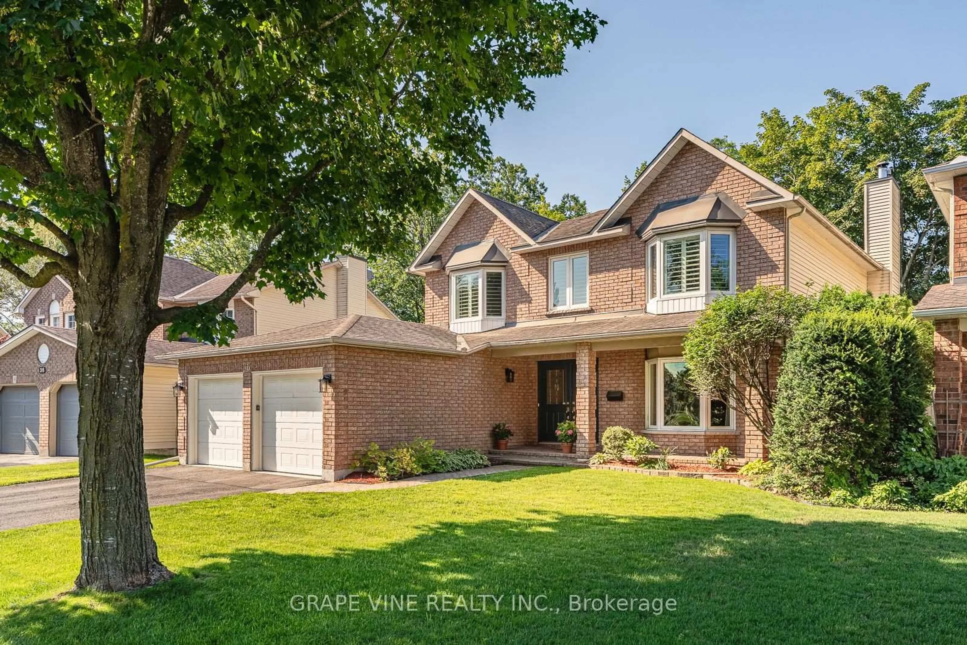 Home with brick exterior material, street for 36 Baslaw Dr, Ottawa Ontario K1G 5J9