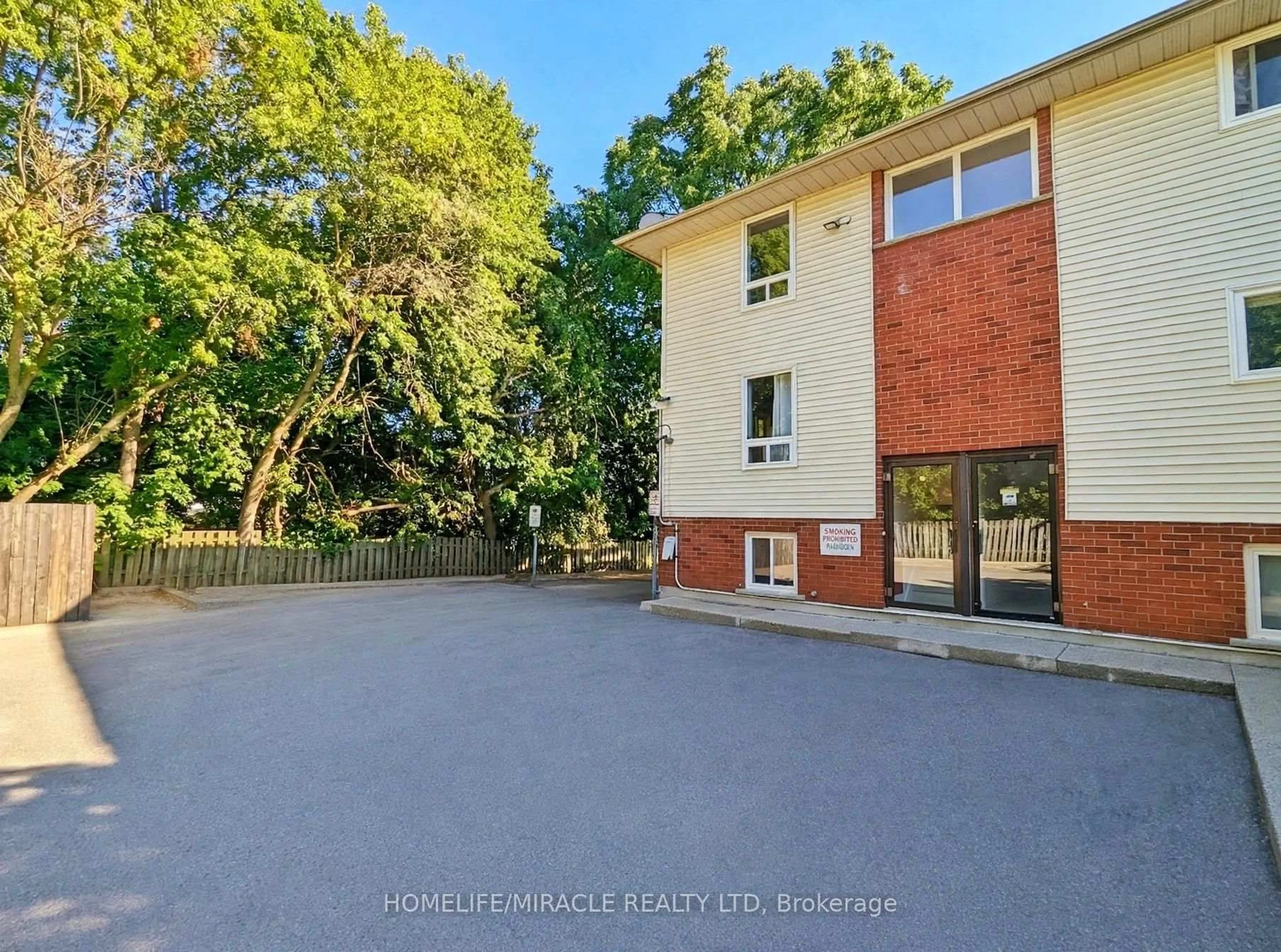 A pic from outside/outdoor area/front of a property/back of a property/a pic from drone, street for 119 Cedar St #14, Kitchener Ontario N2G 3L6