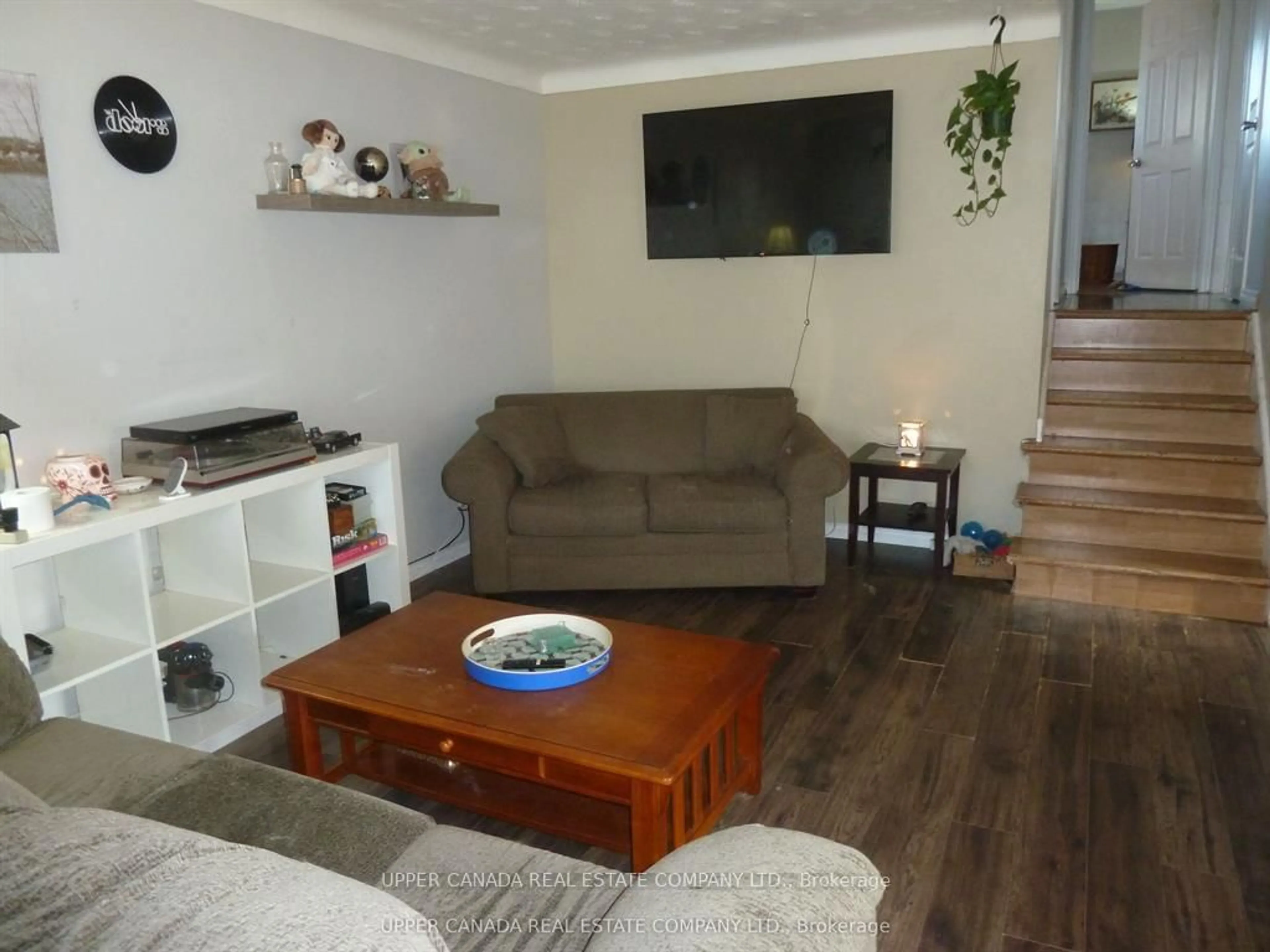 Living room with furniture, wood/laminate floor for 4054 Brookdale Dr, Niagara Falls Ontario L2H 2B3