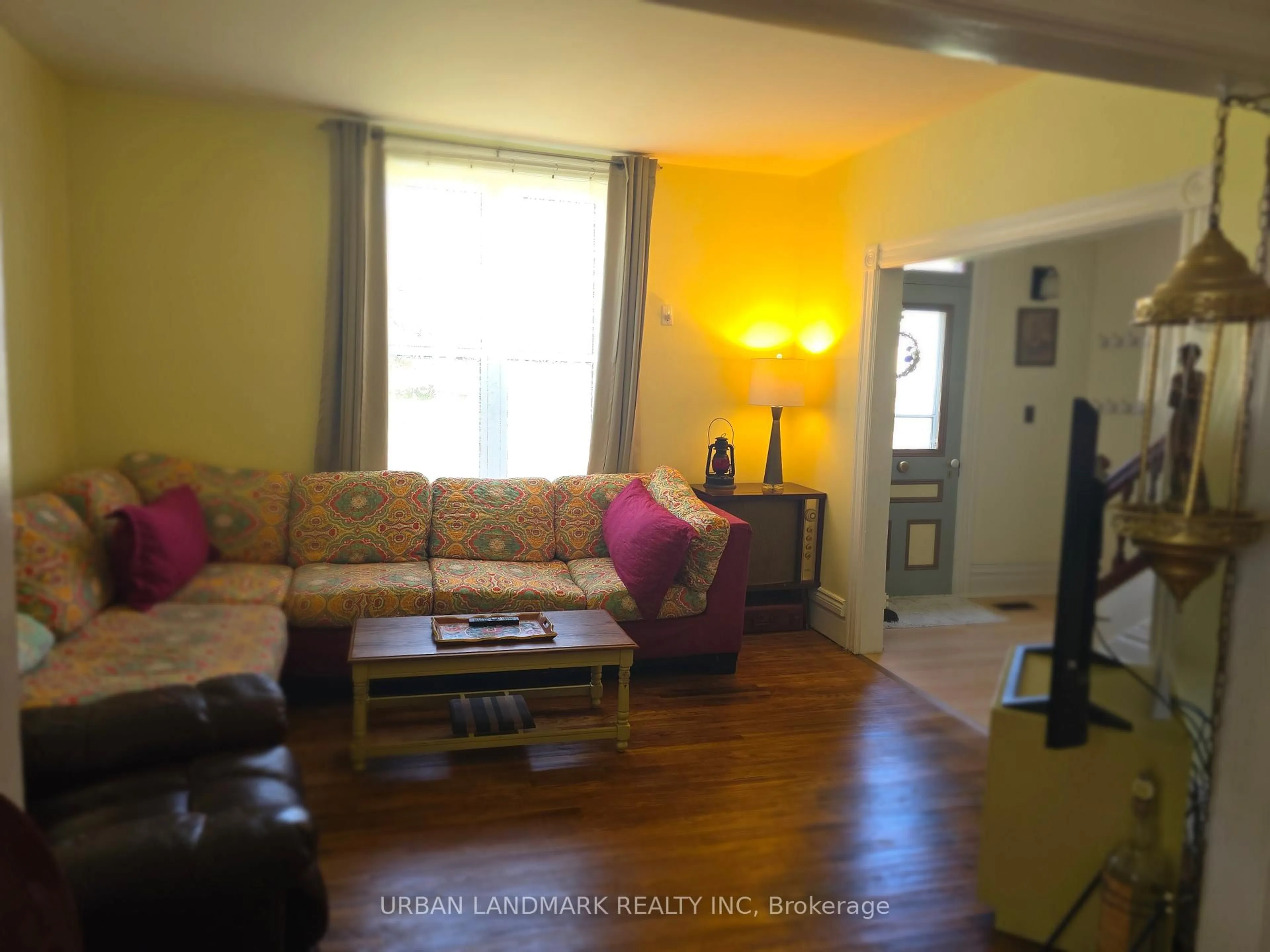 Living room with furniture, wood/laminate floor for 225 St Lawrence St, Madoc Ontario K0K 2K0