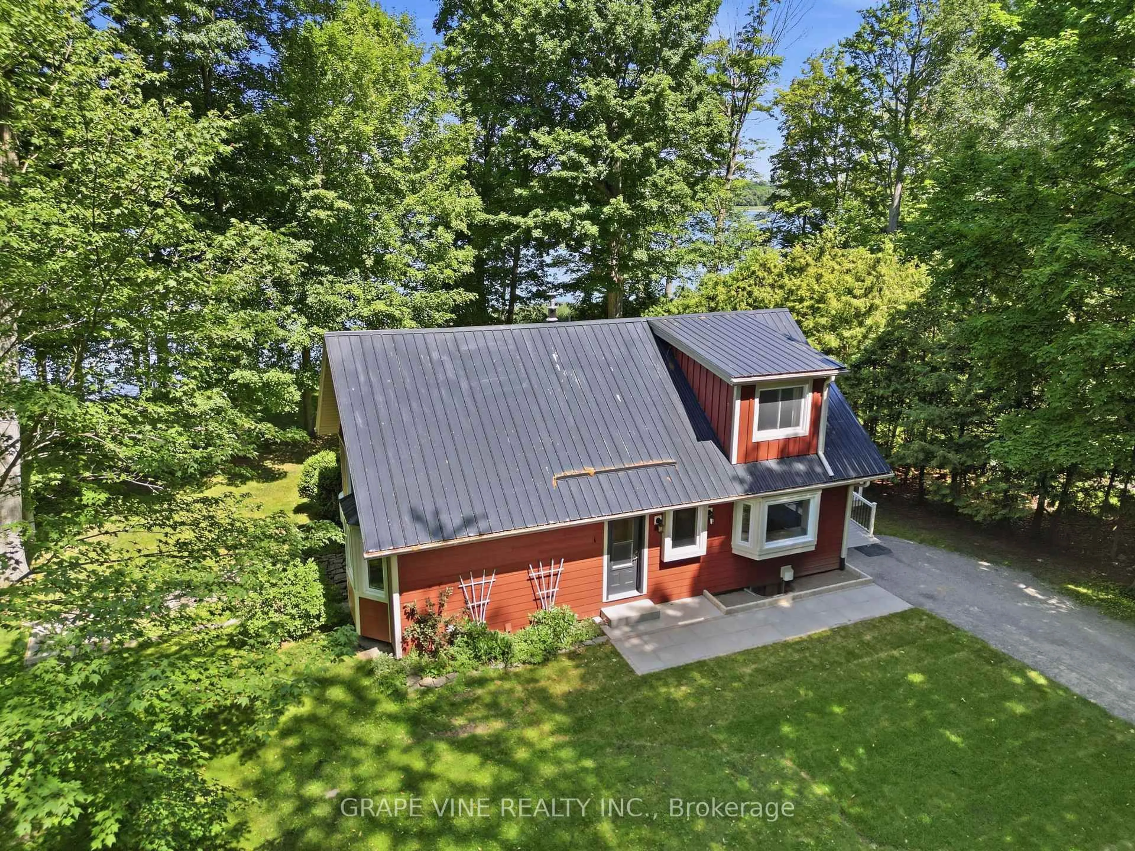 A pic from outside/outdoor area/front of a property/back of a property/a pic from drone, forest/trees view for 68 Goodman Cres, Prince Edward County Ontario K0K 2T0