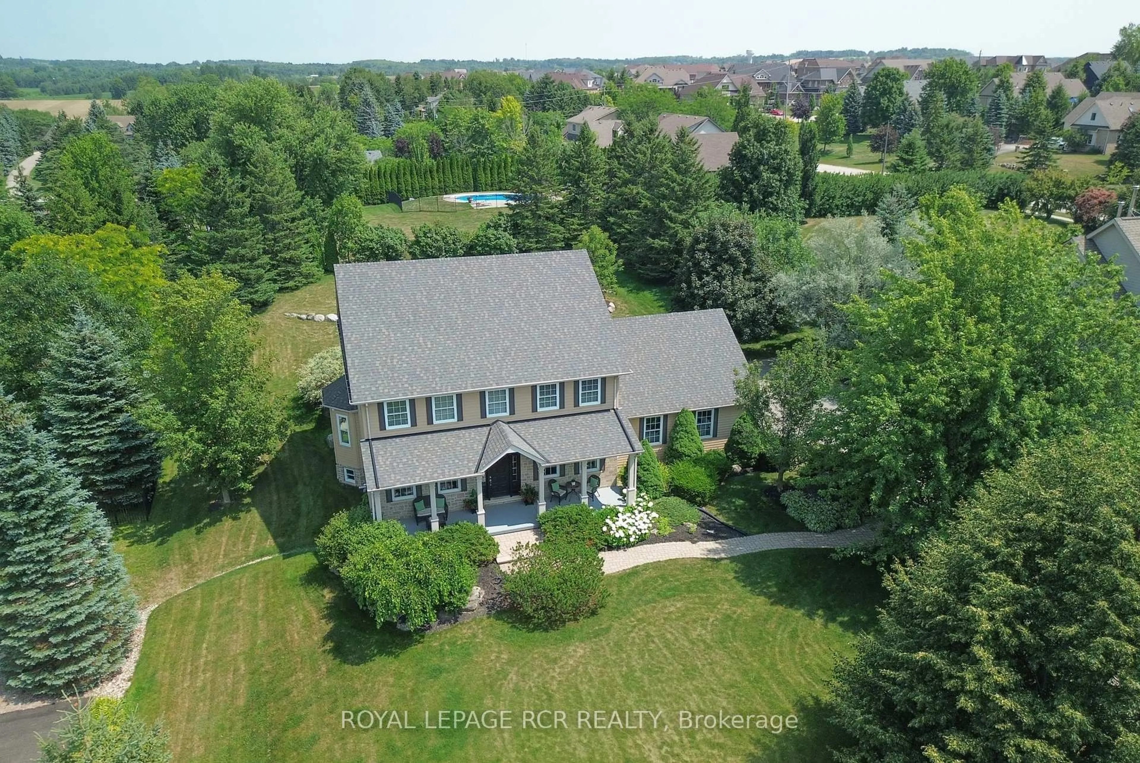 A pic from outside/outdoor area/front of a property/back of a property/a pic from drone, water/lake/river/ocean view for 10 Island Lake Rd, Mono Ontario L9W 5K4