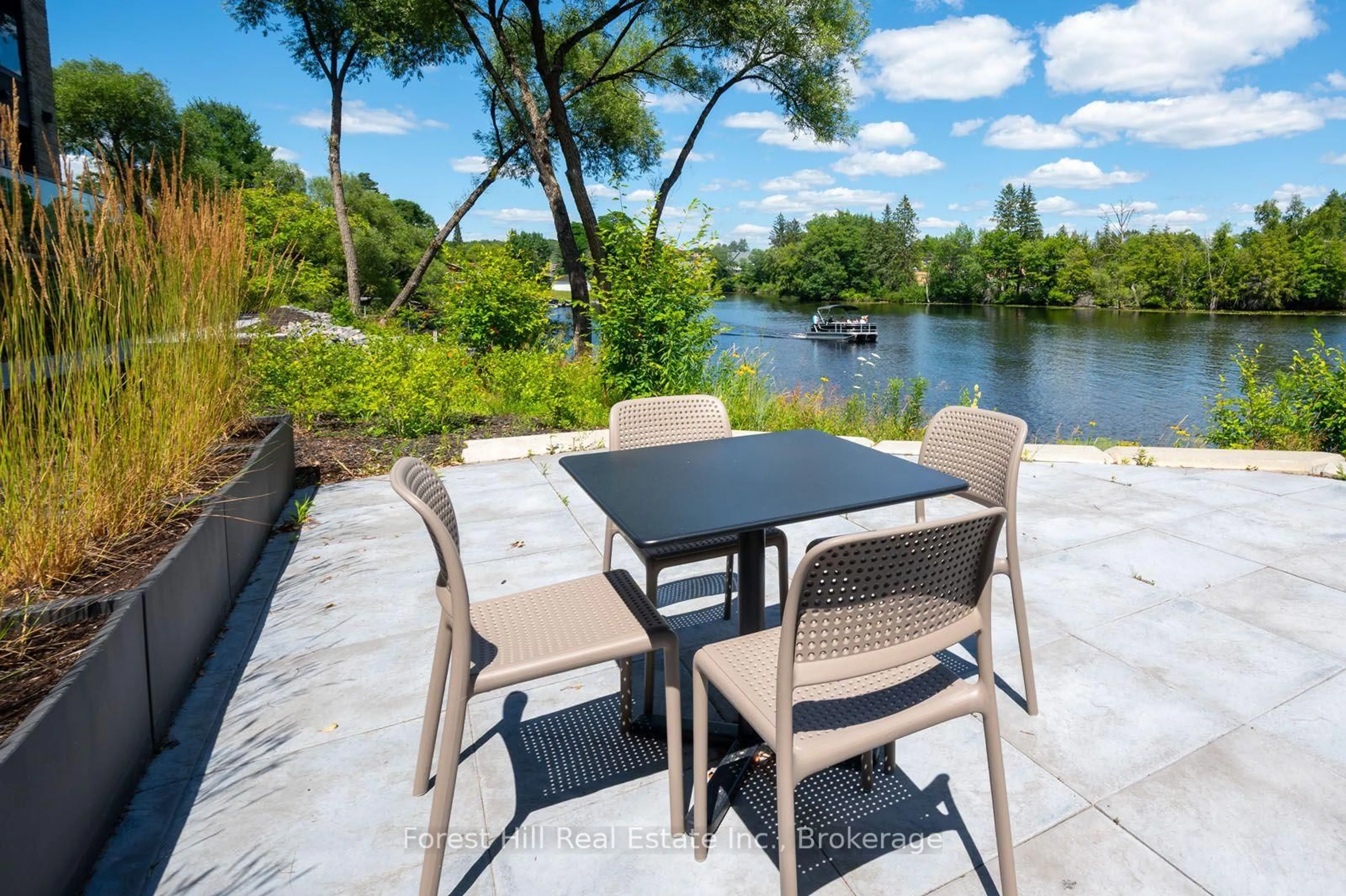 Patio, water/lake/river/ocean view for 32 Brunel Rd #202, Huntsville Ontario P1H 1P5