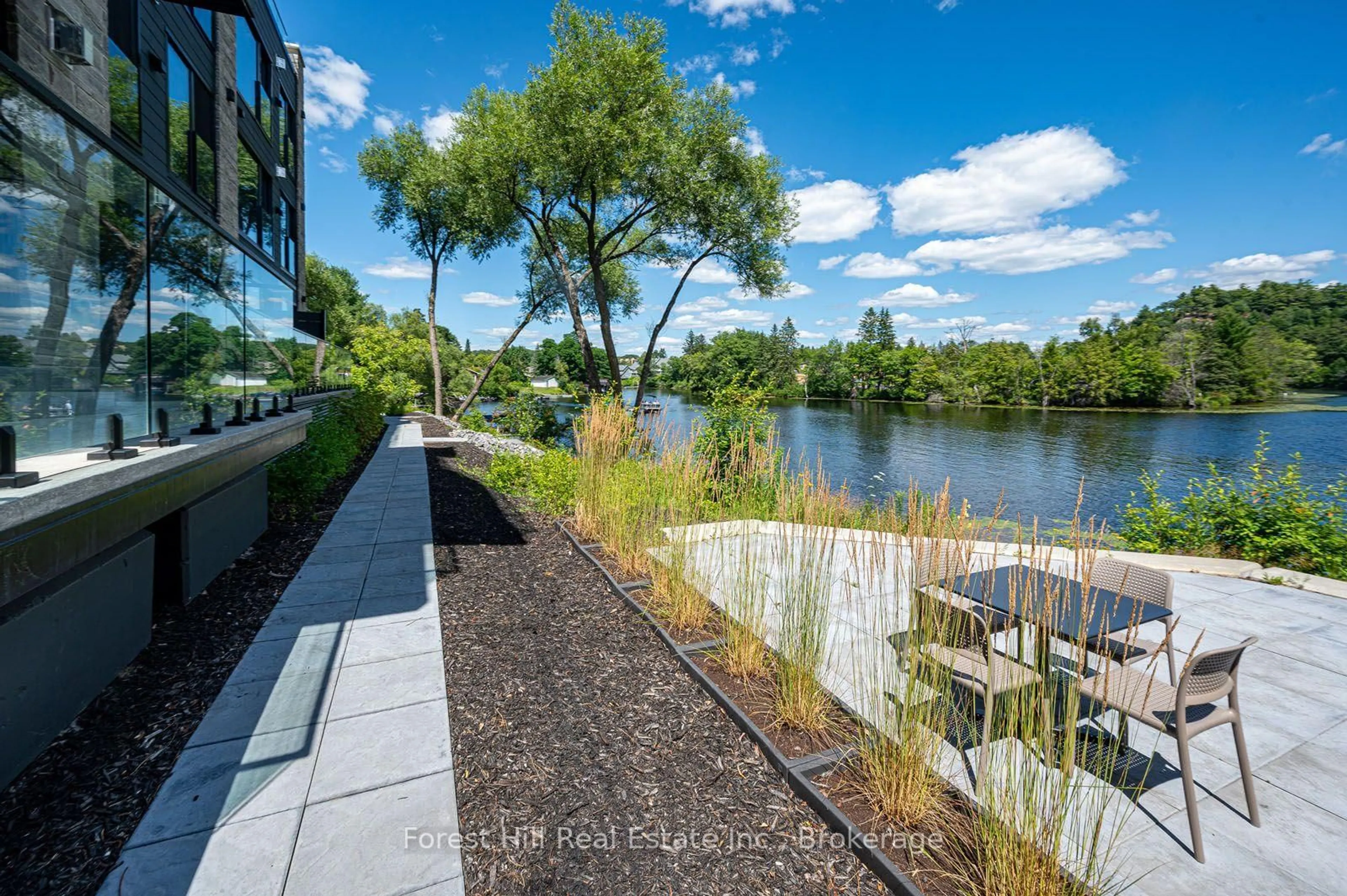 Patio, water/lake/river/ocean view for 32 Brunel Rd #202, Huntsville Ontario P1H 1P5