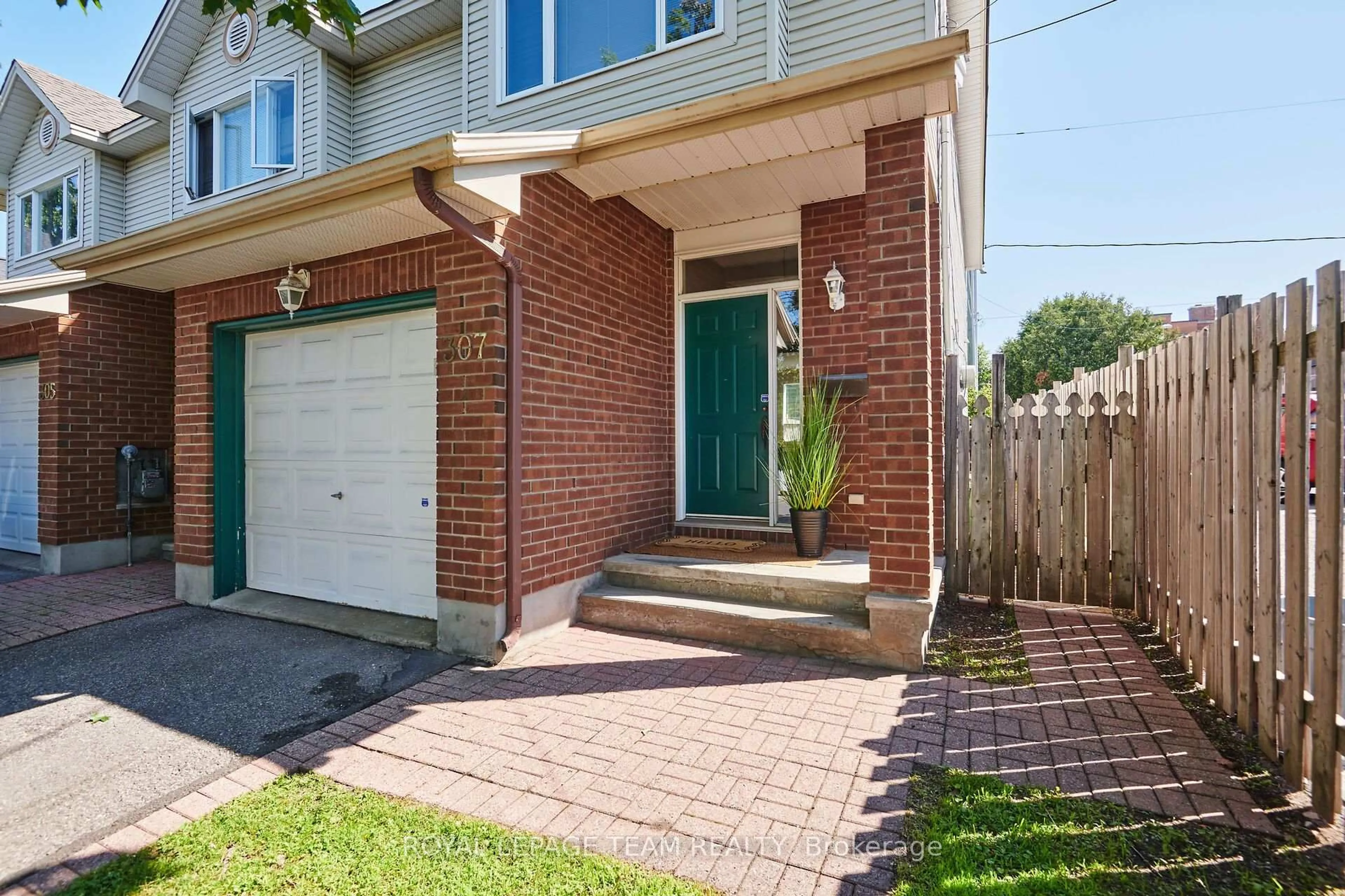Home with brick exterior material, street for 307 Cyr Ave, Ottawa Ontario K1L 7N6