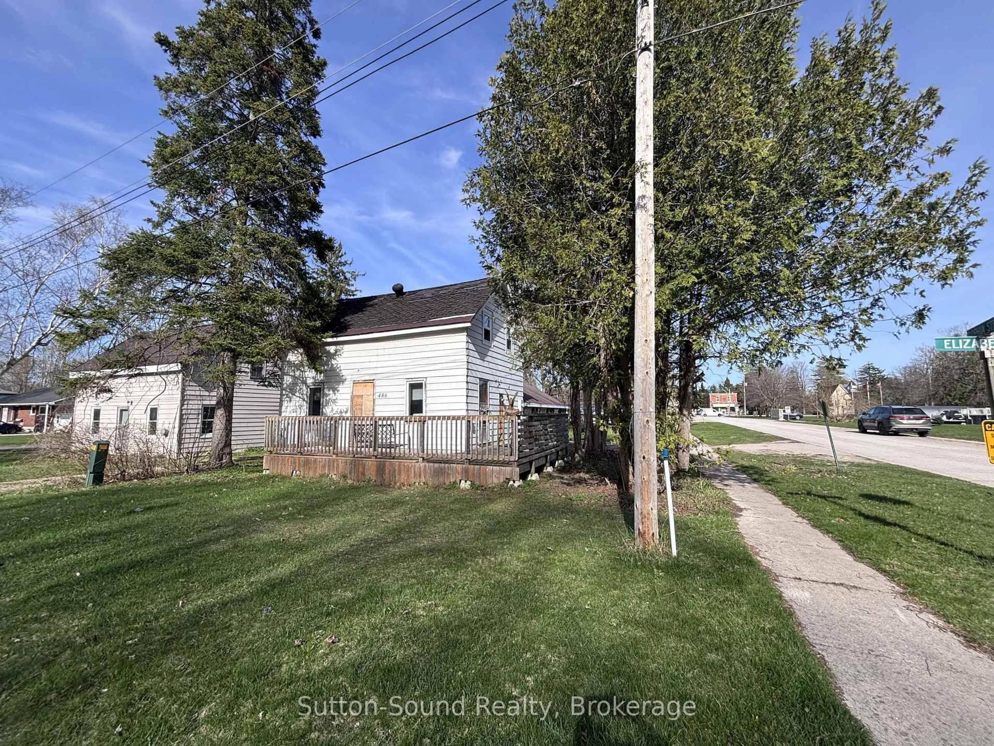 A pic from outside/outdoor area/front of a property/back of a property/a pic from drone, street for 486 Elizabeth St, South Bruce Peninsula Ontario N0H 1P0
