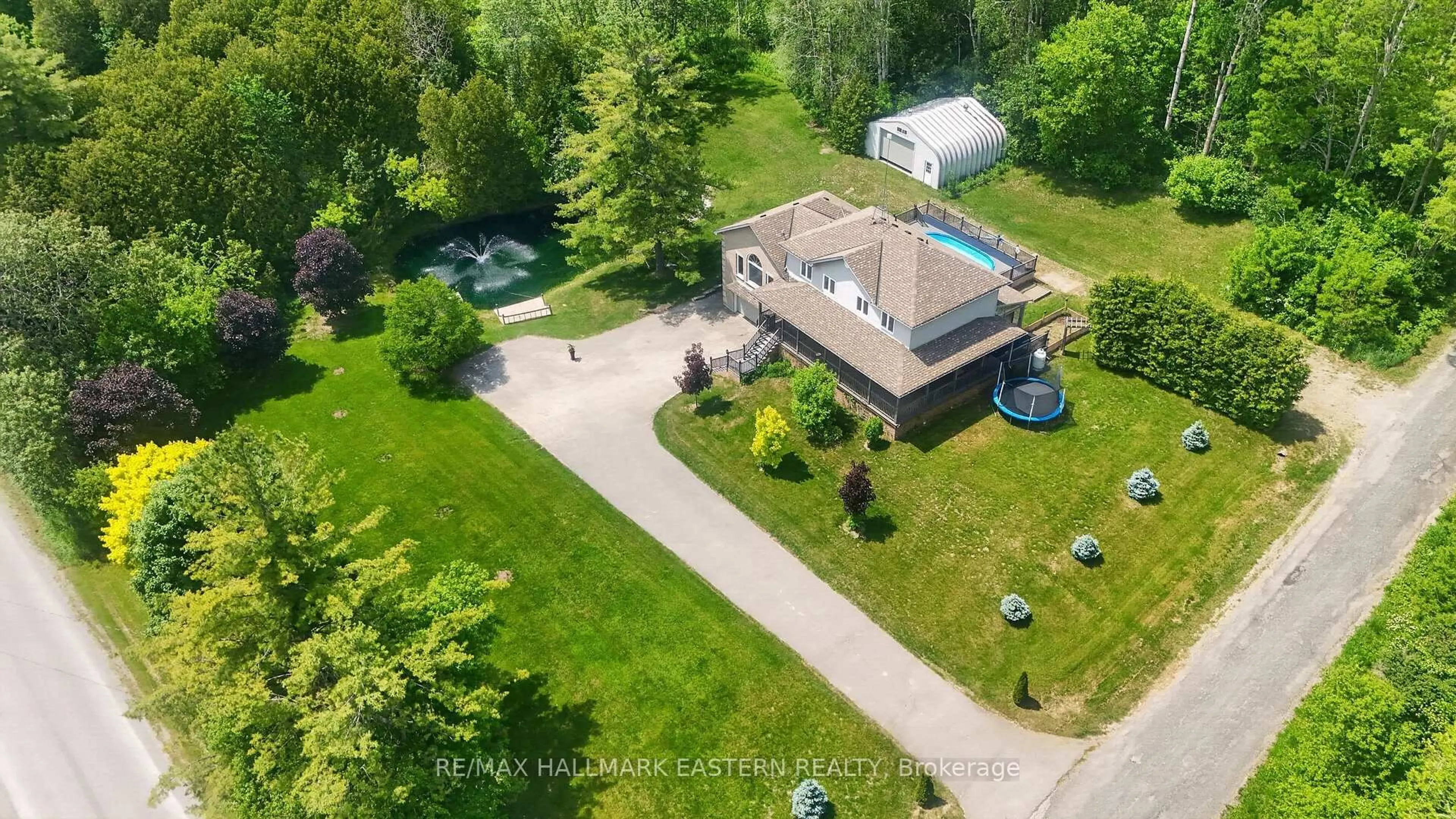 A pic from outside/outdoor area/front of a property/back of a property/a pic from drone, street for 4038 Spring Rd, Hamilton Township Ontario L1A 3V6