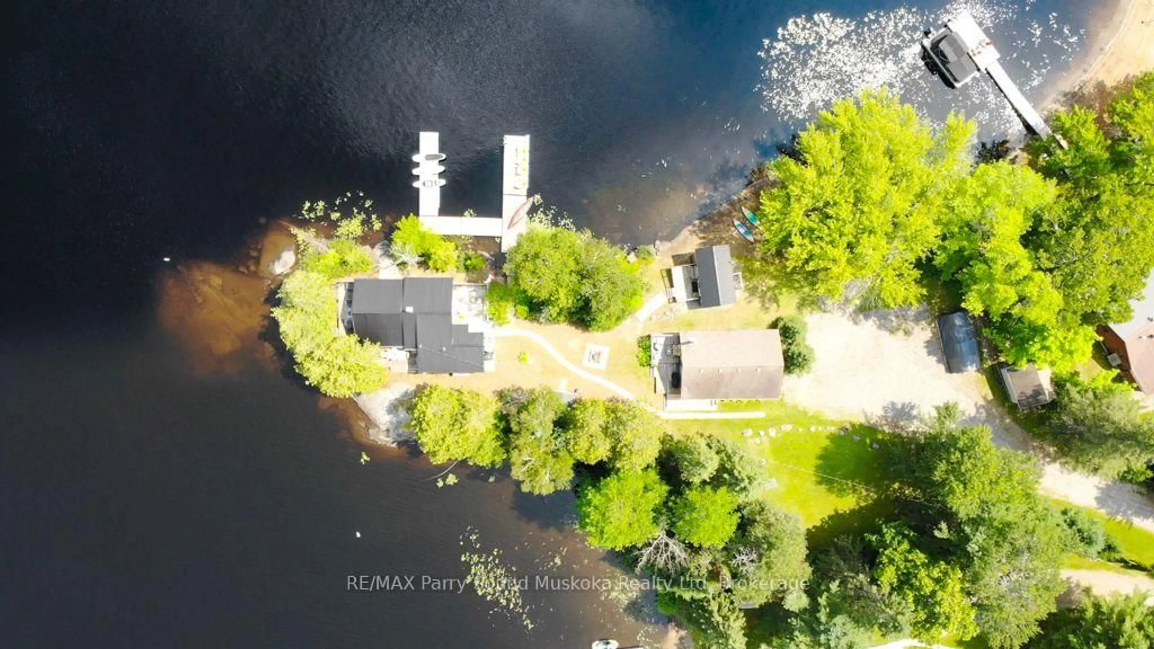 A pic from outside/outdoor area/front of a property/back of a property/a pic from drone, water/lake/river/ocean view for 95 Farleys Rd, Whitestone Ontario P0A 1G0