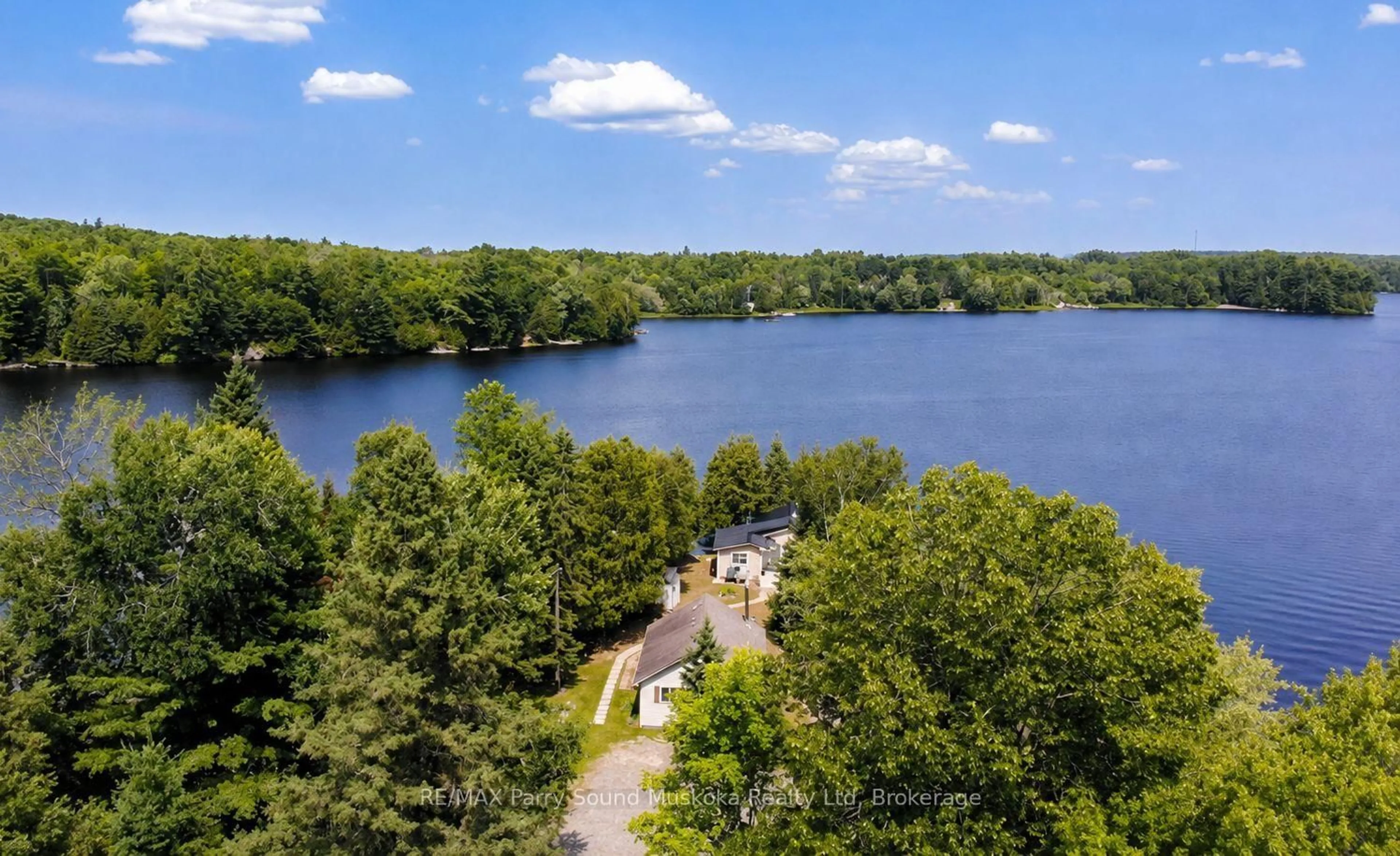 A pic from outside/outdoor area/front of a property/back of a property/a pic from drone, water/lake/river/ocean view for 95 Farleys Rd, Whitestone Ontario P0A 1G0