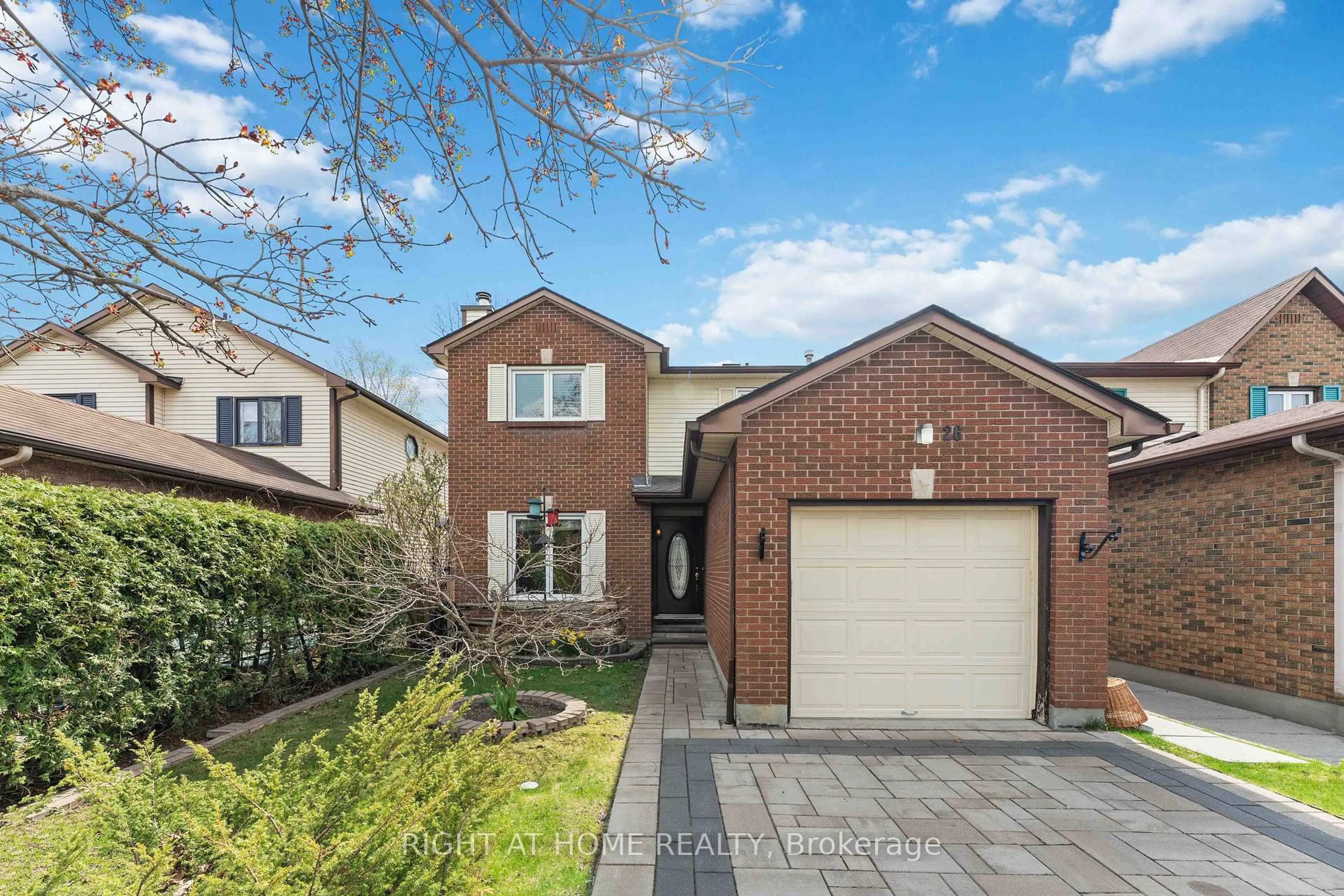 Home with brick exterior material, street for 26 Denham Way, Ottawa Ontario K2S 1H5