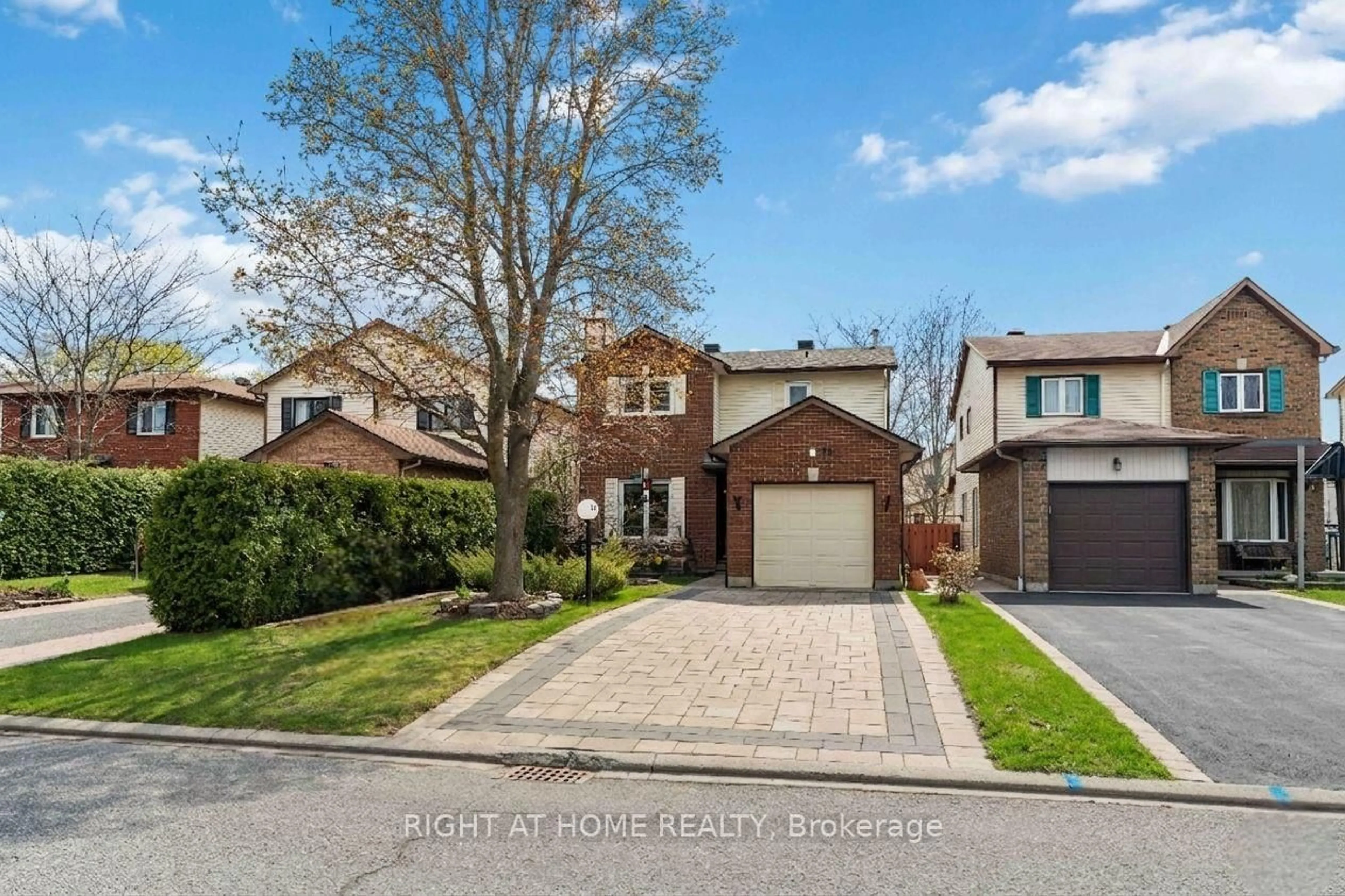 Home with brick exterior material, street for 26 Denham Way, Ottawa Ontario K2S 1H5