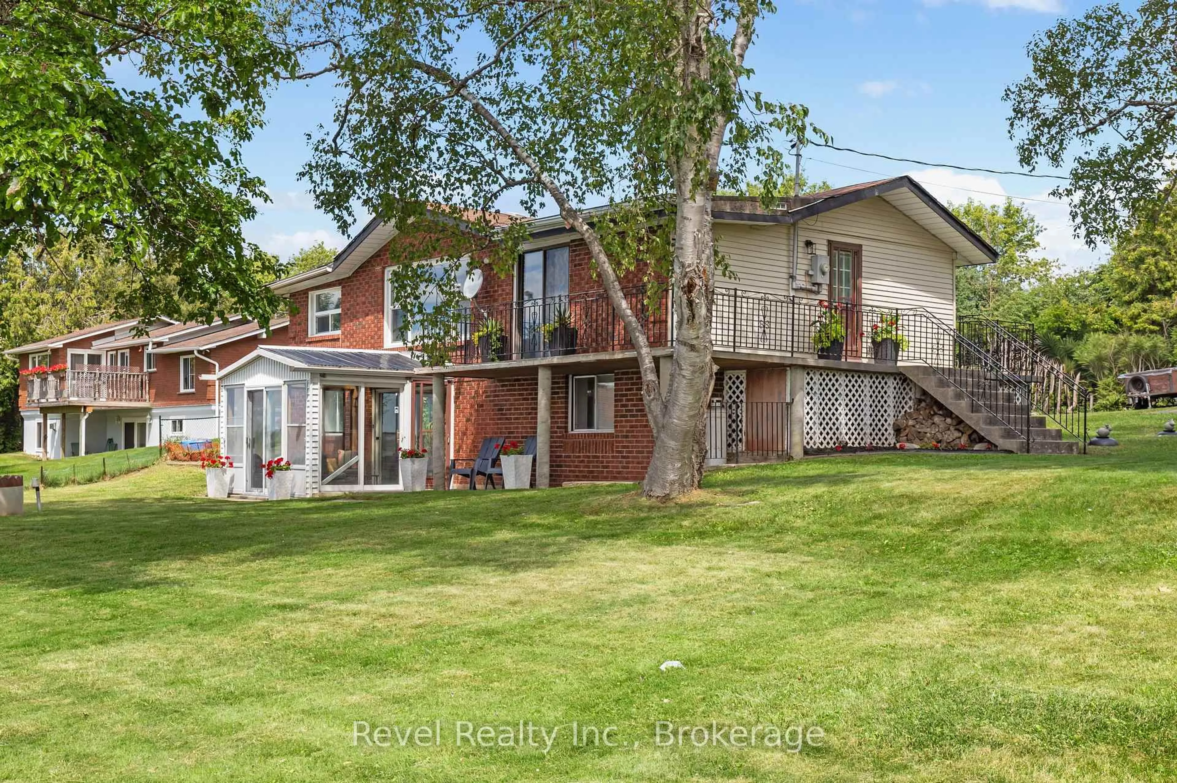 A pic from outside/outdoor area/front of a property/back of a property/a pic from drone, water/lake/river/ocean view for 79 Oakdene Cres, Kawartha Lakes Ontario K0M 2C0