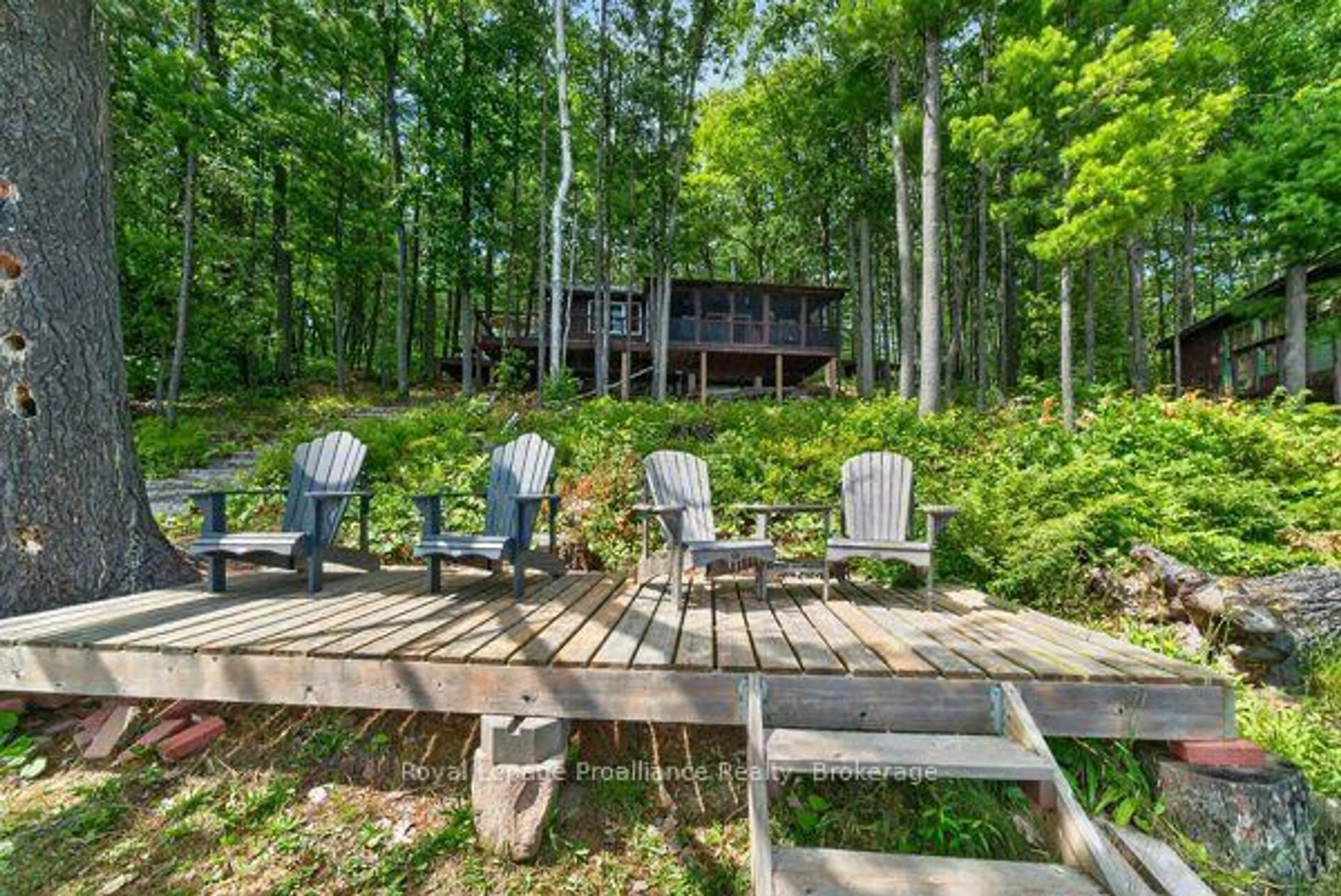 Patio, forest/trees view for 406 Mazinaw Lake Rd, Brighton Ontario K0K 1H0