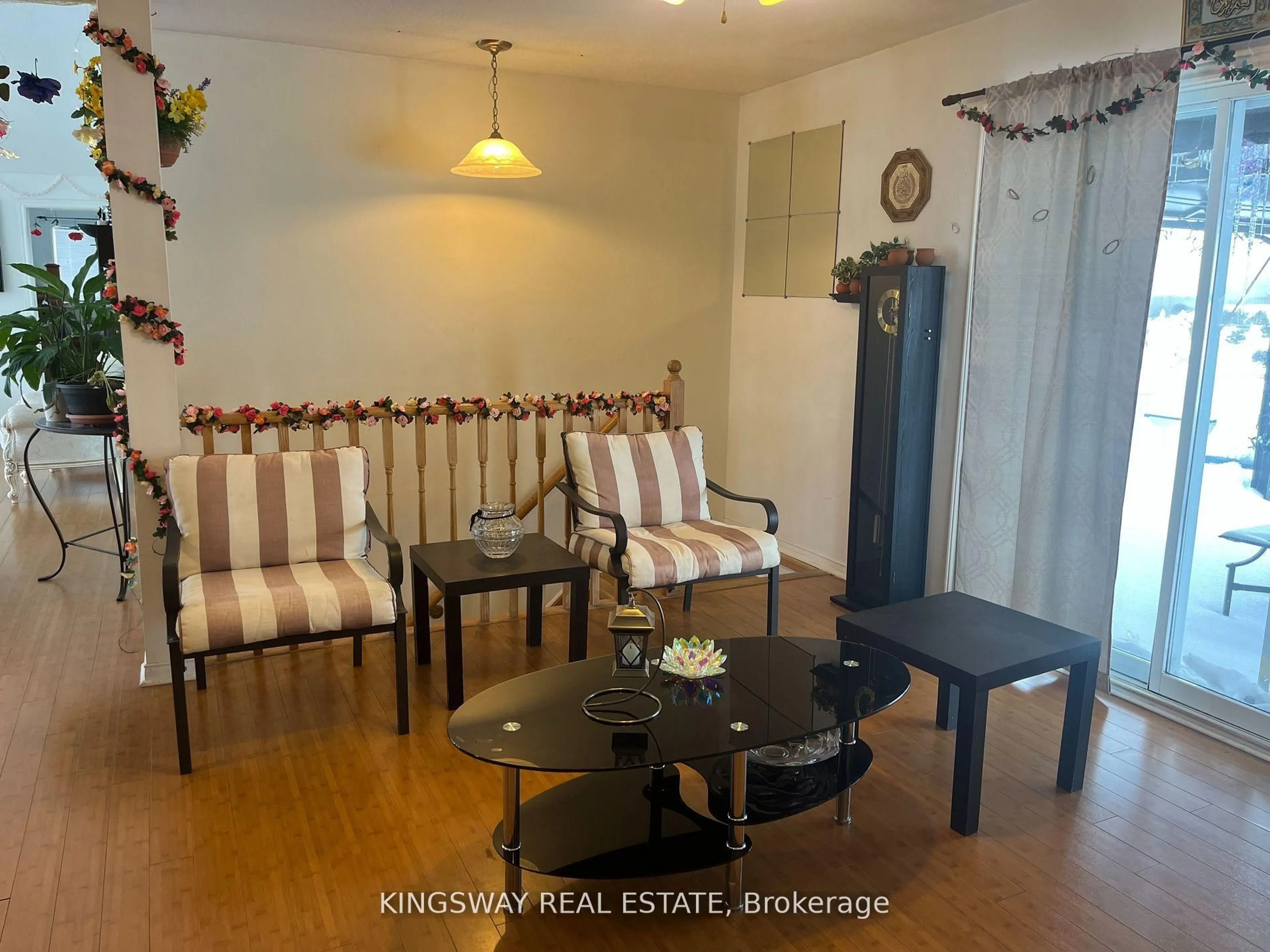 Living room with furniture, wood/laminate floor for 30 Mountainview Rd, Mulmur Ontario L9V 3H5