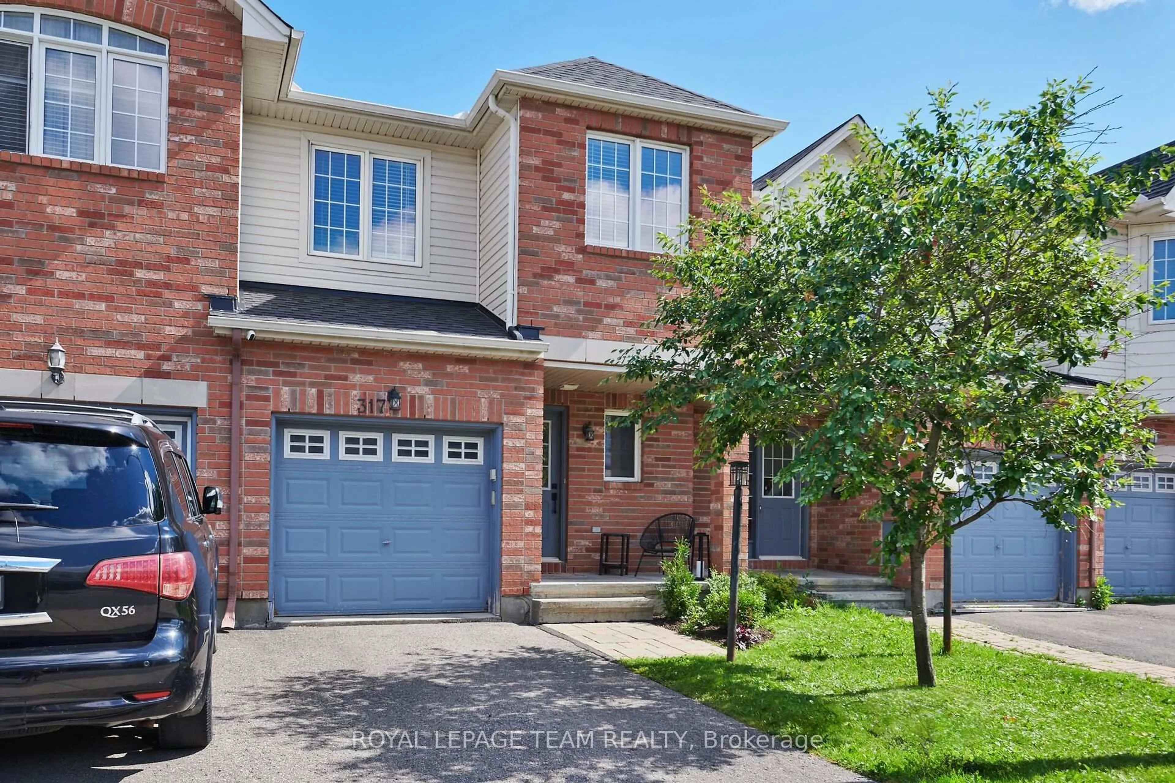 Home with brick exterior material, street for 317 Copperfield Cres, Ottawa Ontario K2J 0L2