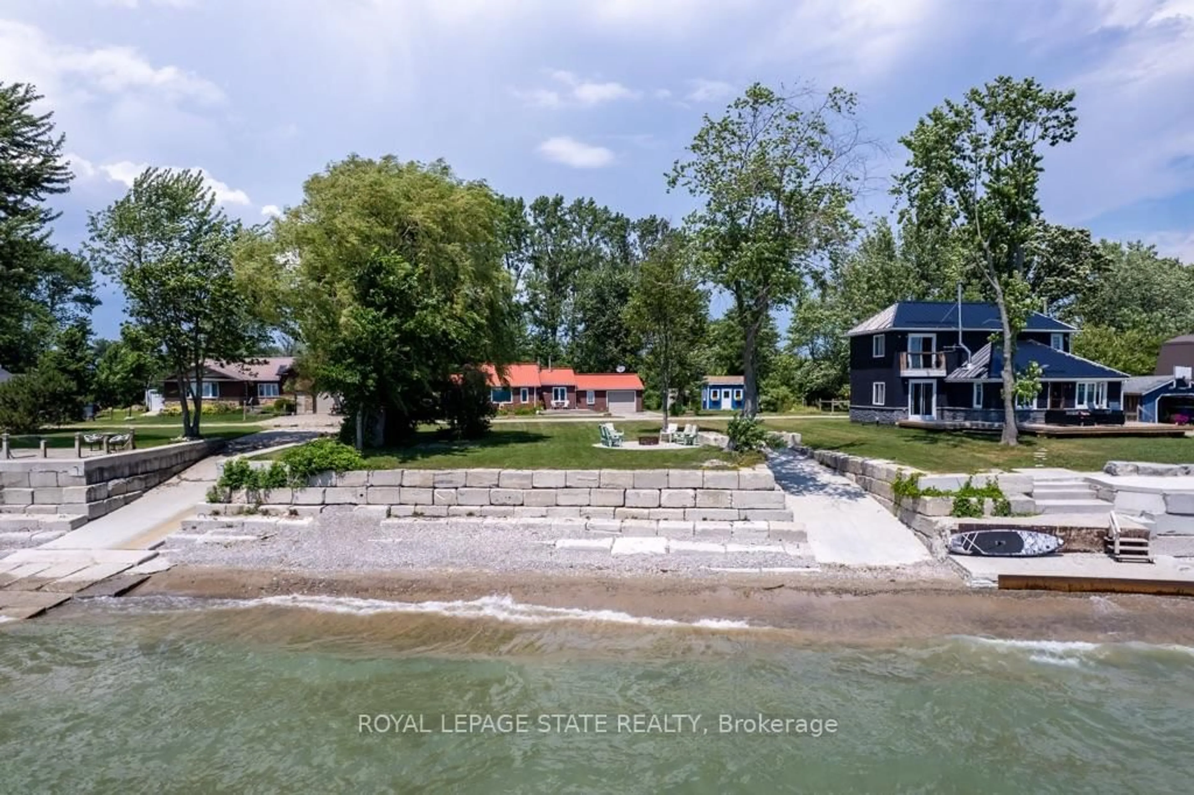 A pic from outside/outdoor area/front of a property/back of a property/a pic from drone, water/lake/river/ocean view for 23 Lakeview Line, Haldimand Ontario N1A 2W8