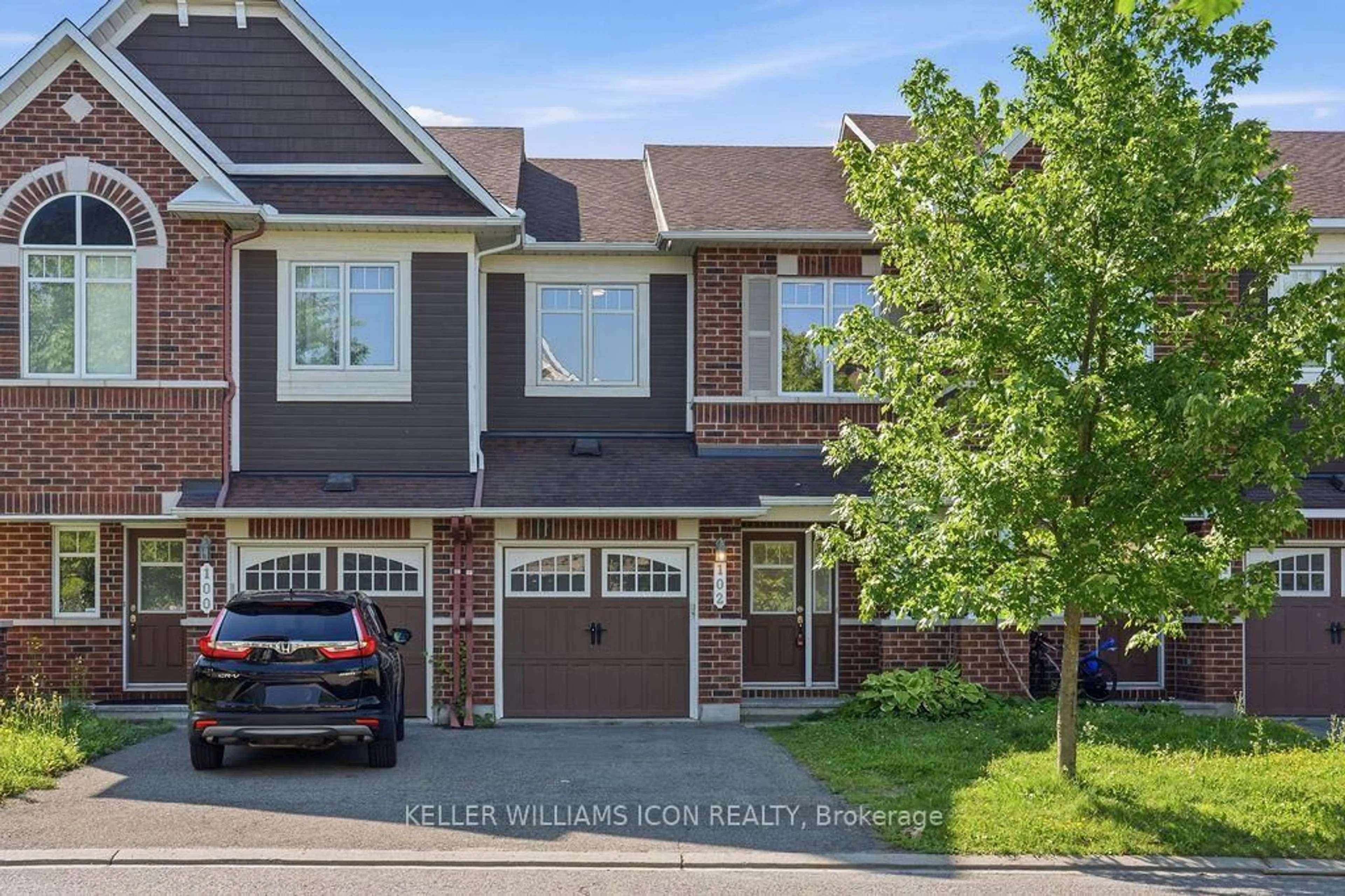 Home with brick exterior material, street for 102 Garrity Cres, Ottawa Ontario K2J 3T4