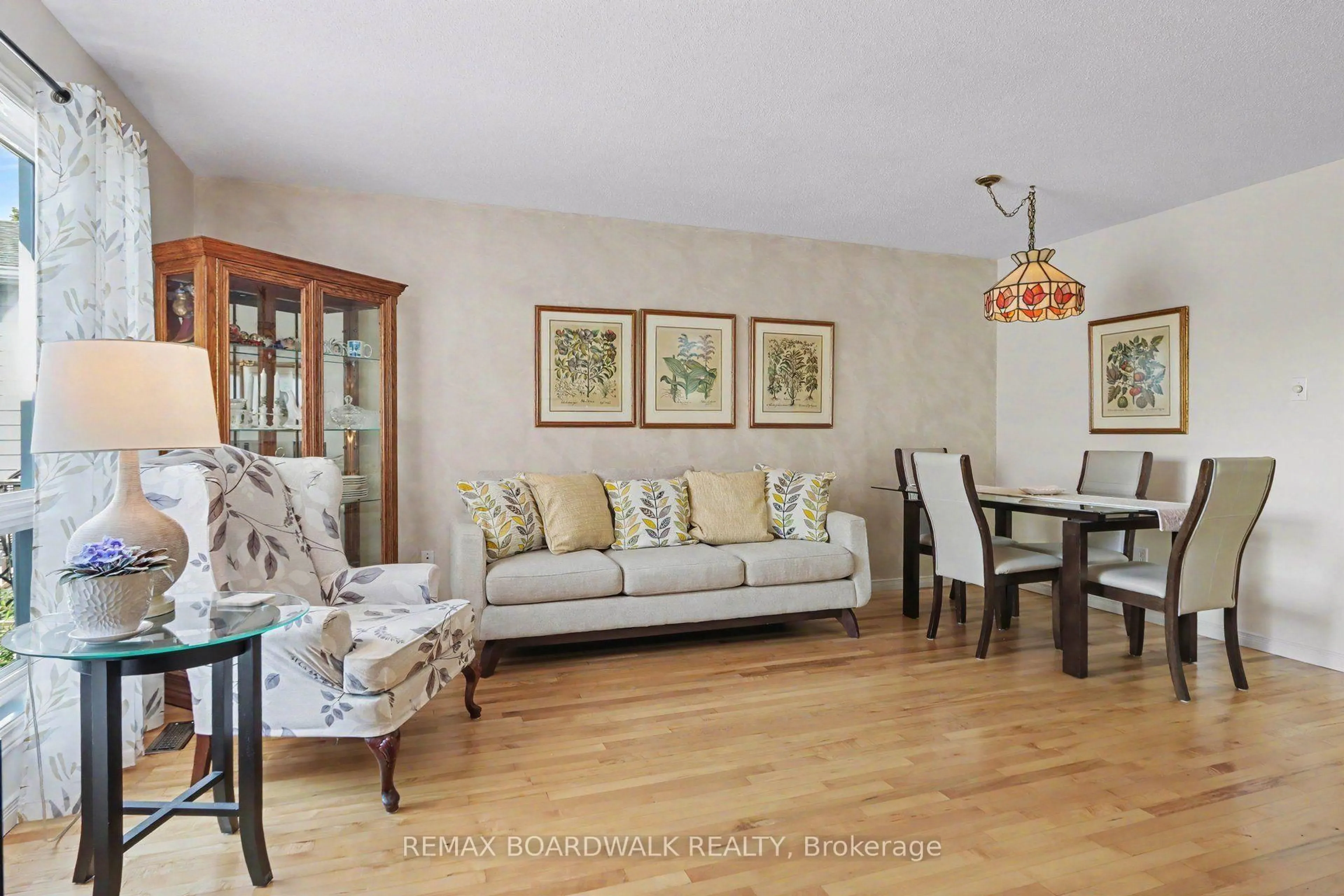 Living room with furniture, wood/laminate floor for 150 Hughes St, Carleton Place Ontario K7C 4N1