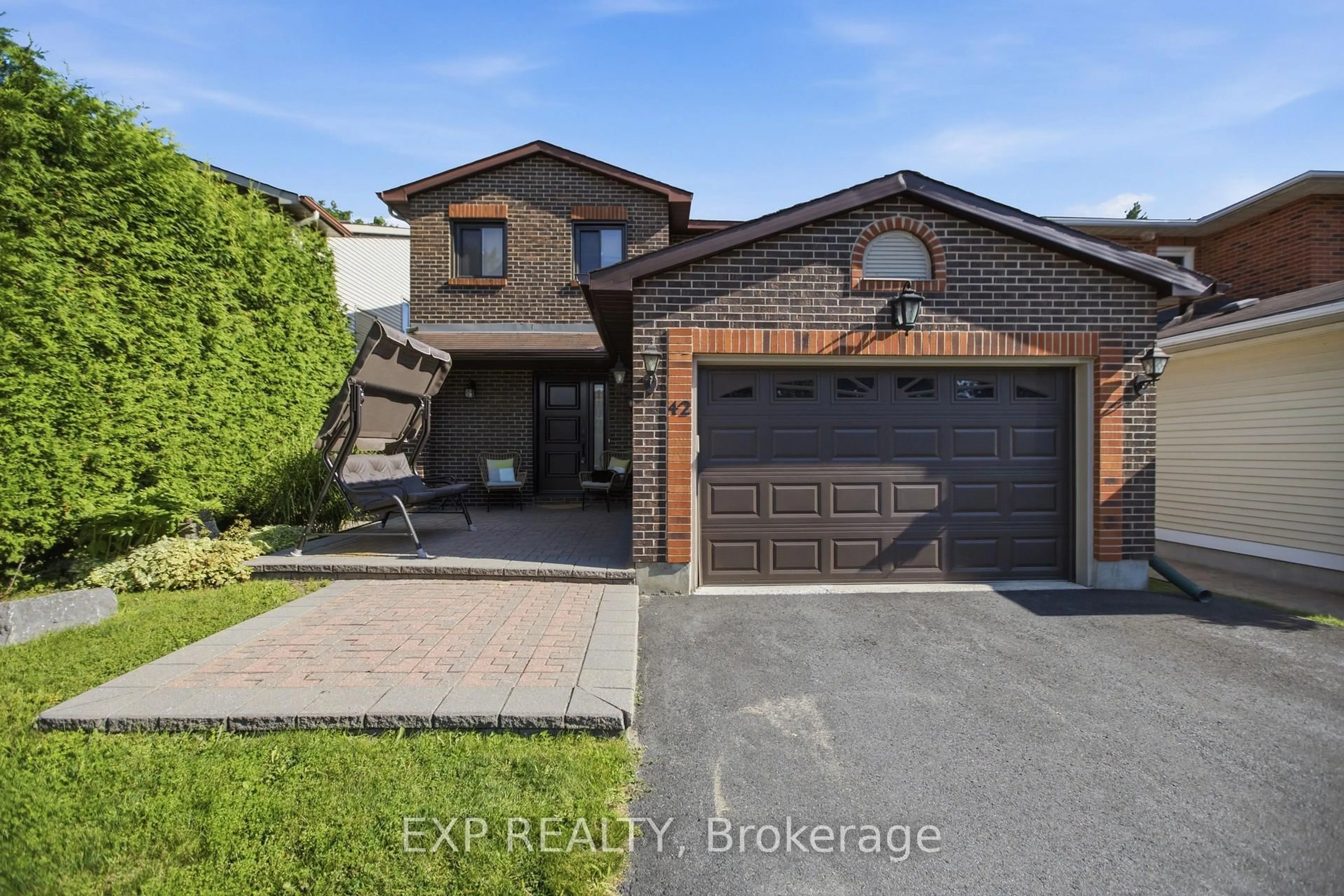 Home with brick exterior material, street for 42 Valley Ridge St, Ottawa Ontario K2E 7W2