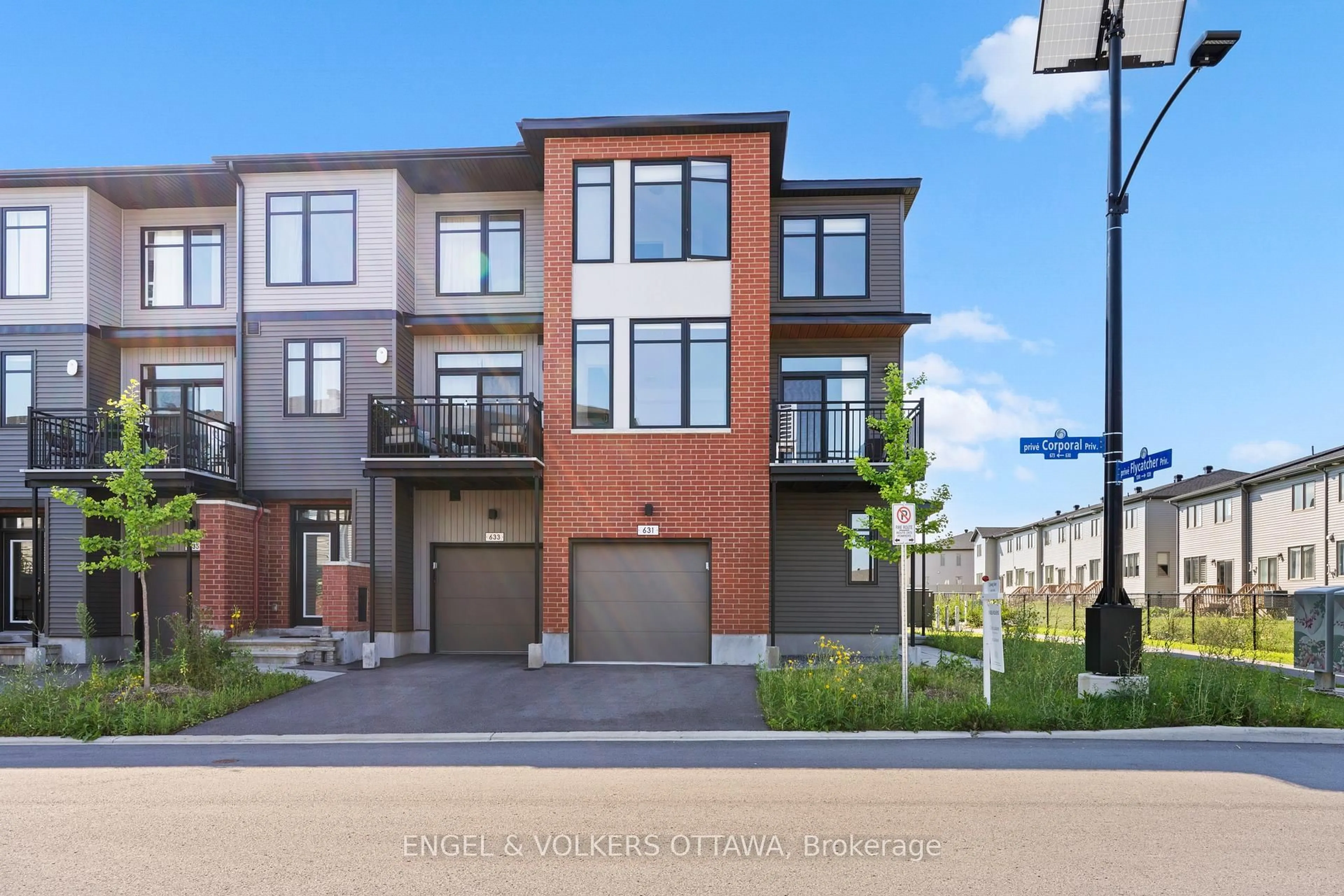 Home with brick exterior material, street for 631 Corporal Private, Ottawa Ontario K1X 0M7