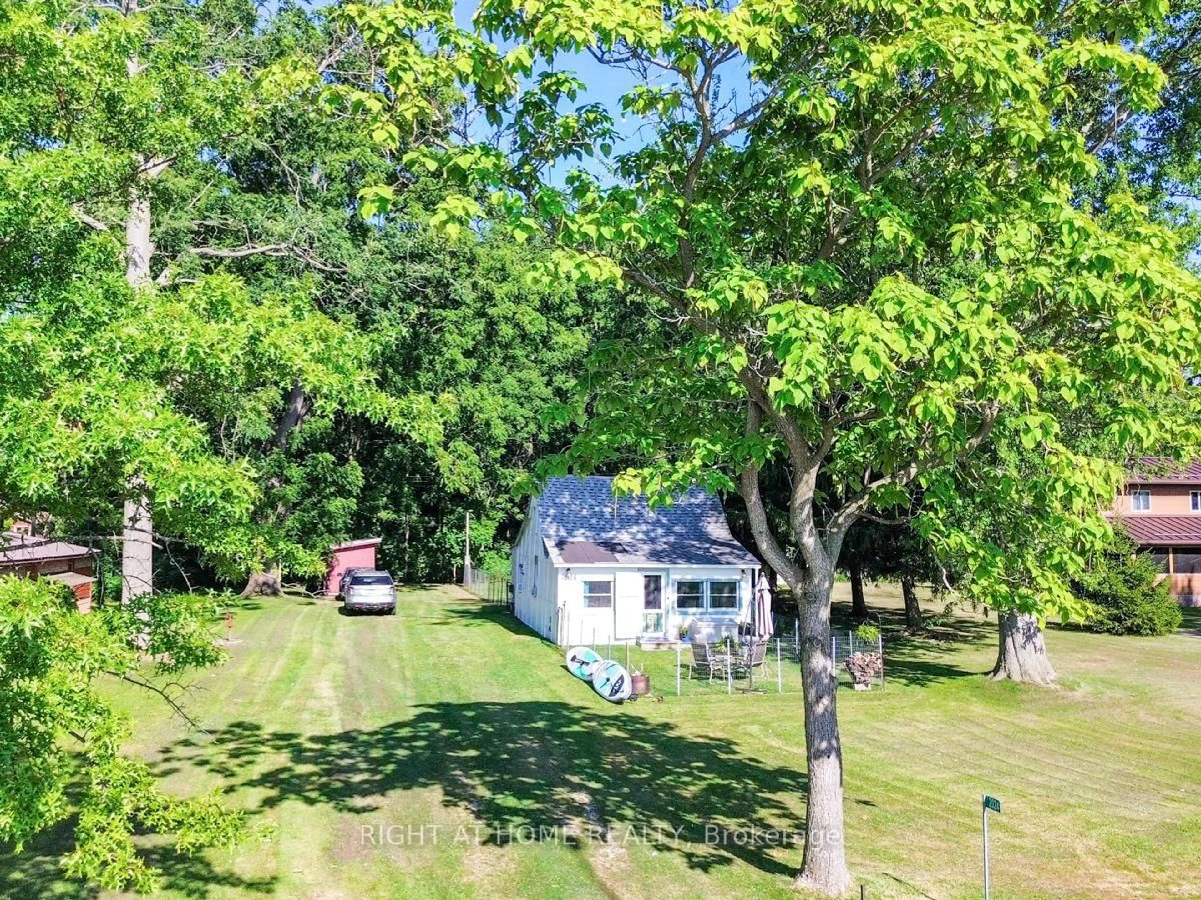 A pic from outside/outdoor area/front of a property/back of a property/a pic from drone, water/lake/river/ocean view for 2024 River Rd, Chatham-Kent Ontario N8A 4K9