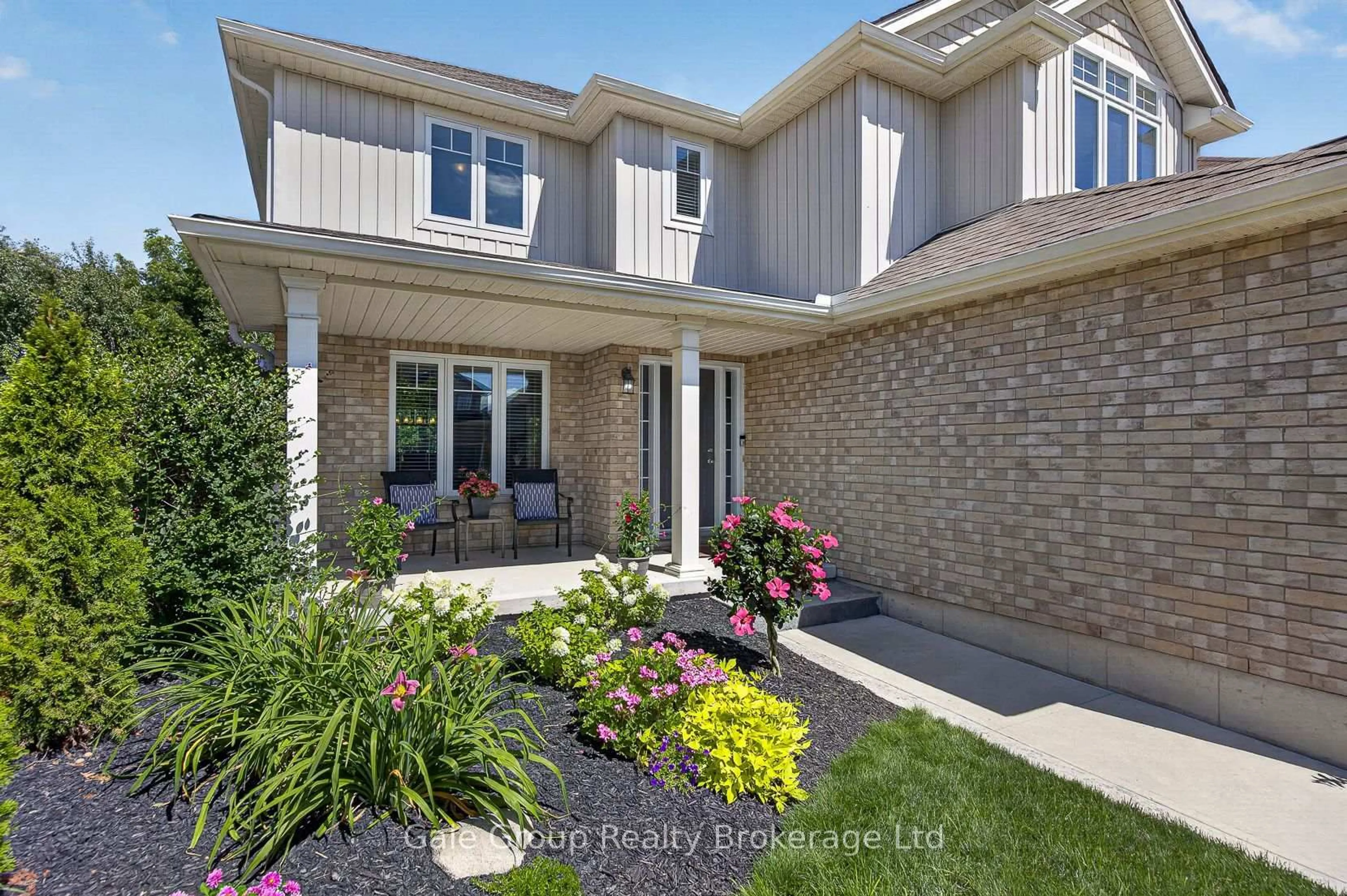 Home with brick exterior material, street for 205 Munnoch Blvd, Woodstock Ontario N4T 1V7