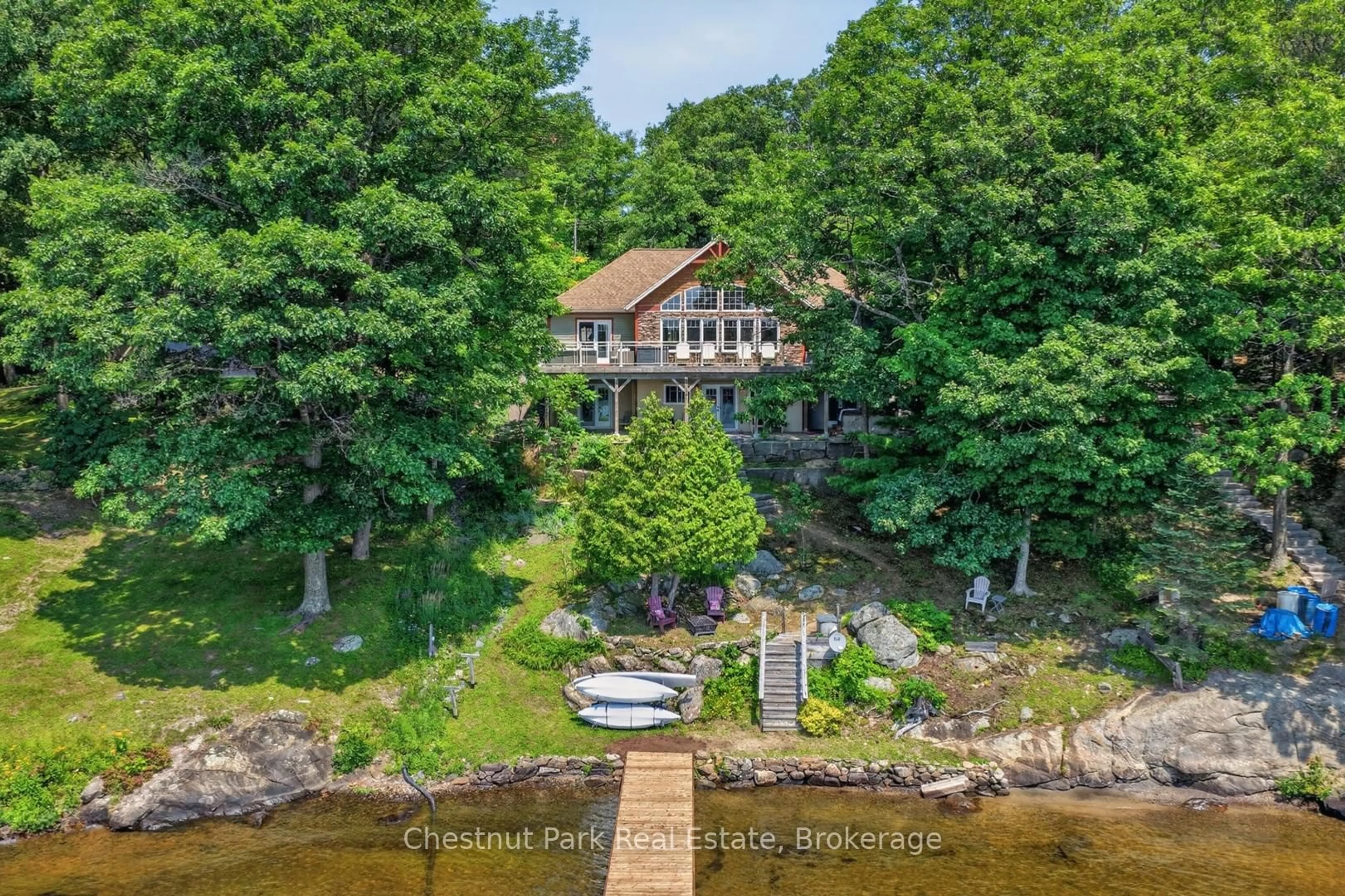 A pic from outside/outdoor area/front of a property/back of a property/a pic from drone, water/lake/river/ocean view for 1519 Muskoka 118 Rd #3, Muskoka Lakes Ontario P1L 1W8