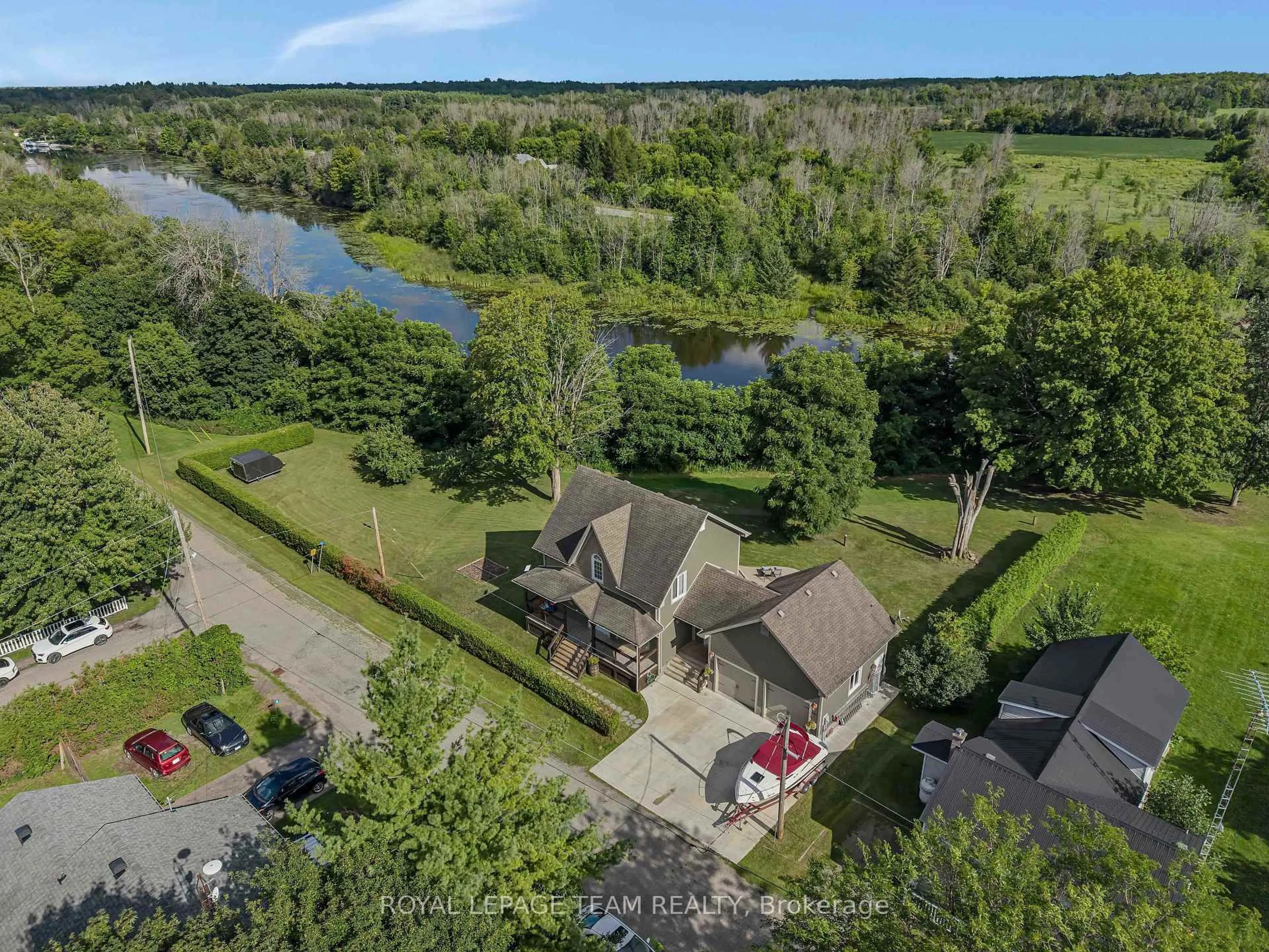 A pic from outside/outdoor area/front of a property/back of a property/a pic from drone, water/lake/river/ocean view for 22 Centre St, North Grenville Ontario K0G 1B0