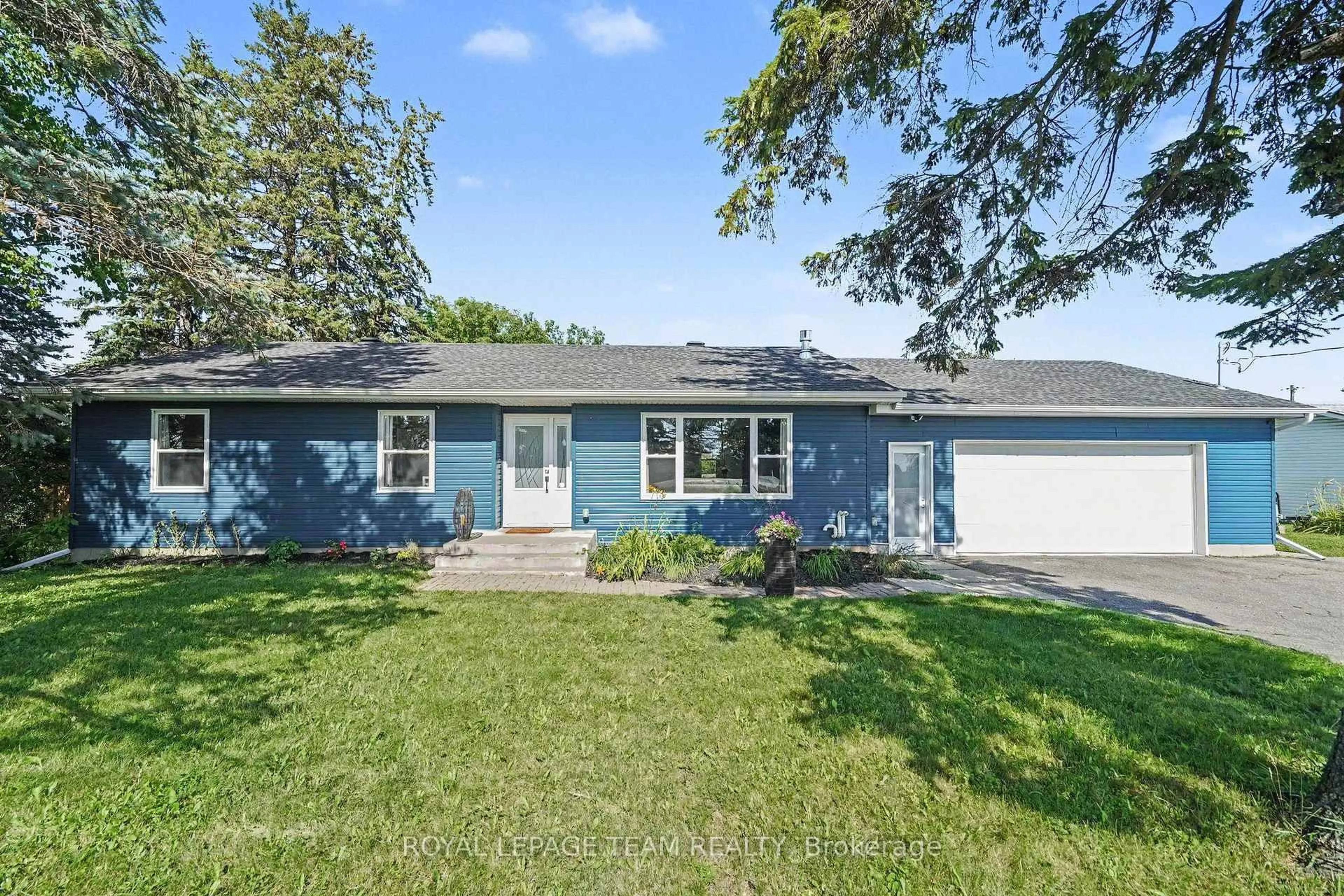 Home with vinyl exterior material, street for 2477 Merivale Rd, Ottawa Ontario K2C 3H1