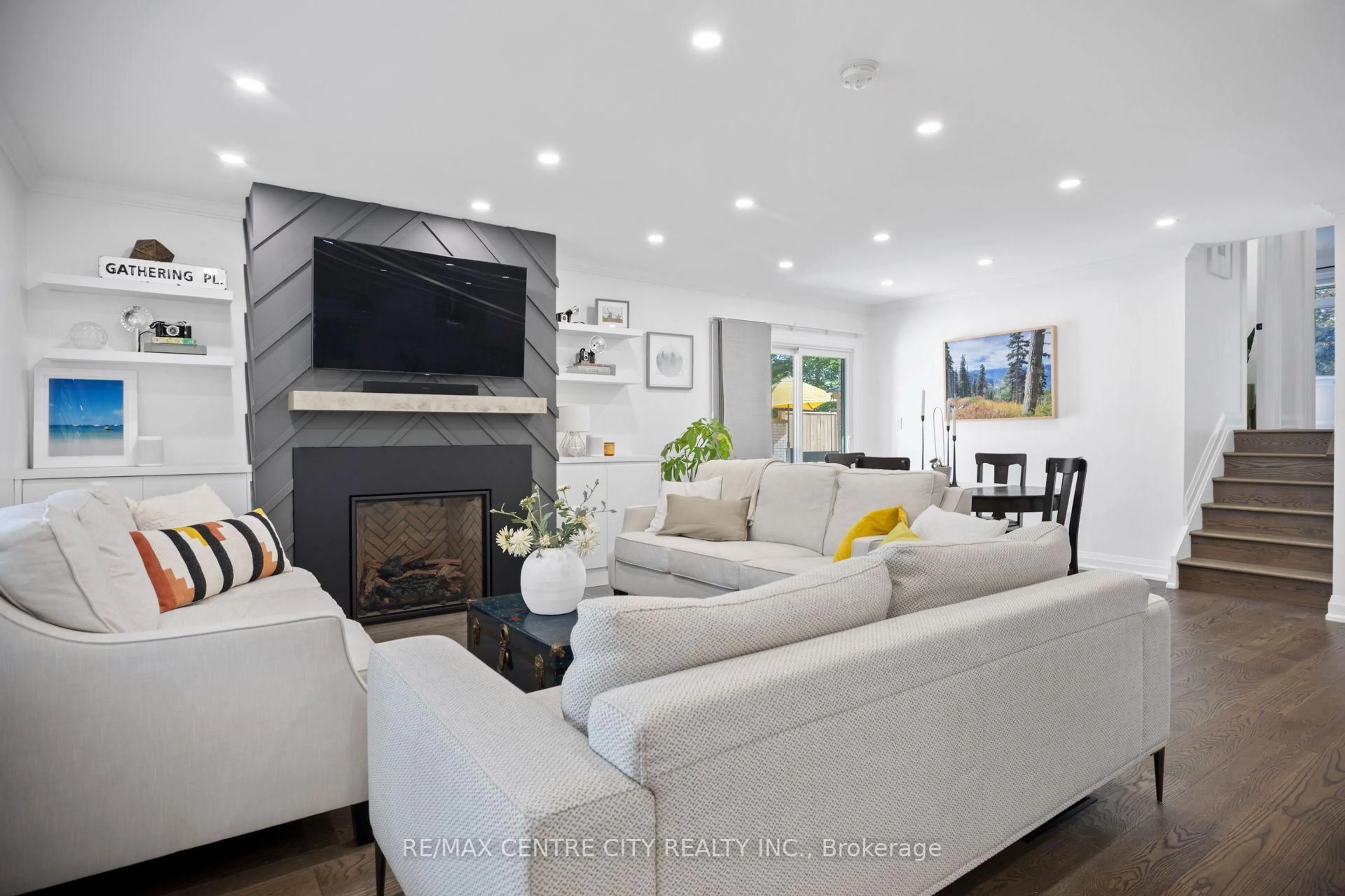 Living room with furniture, wood/laminate floor for 1223 Royal York Rd, London North Ontario N6H 4A1