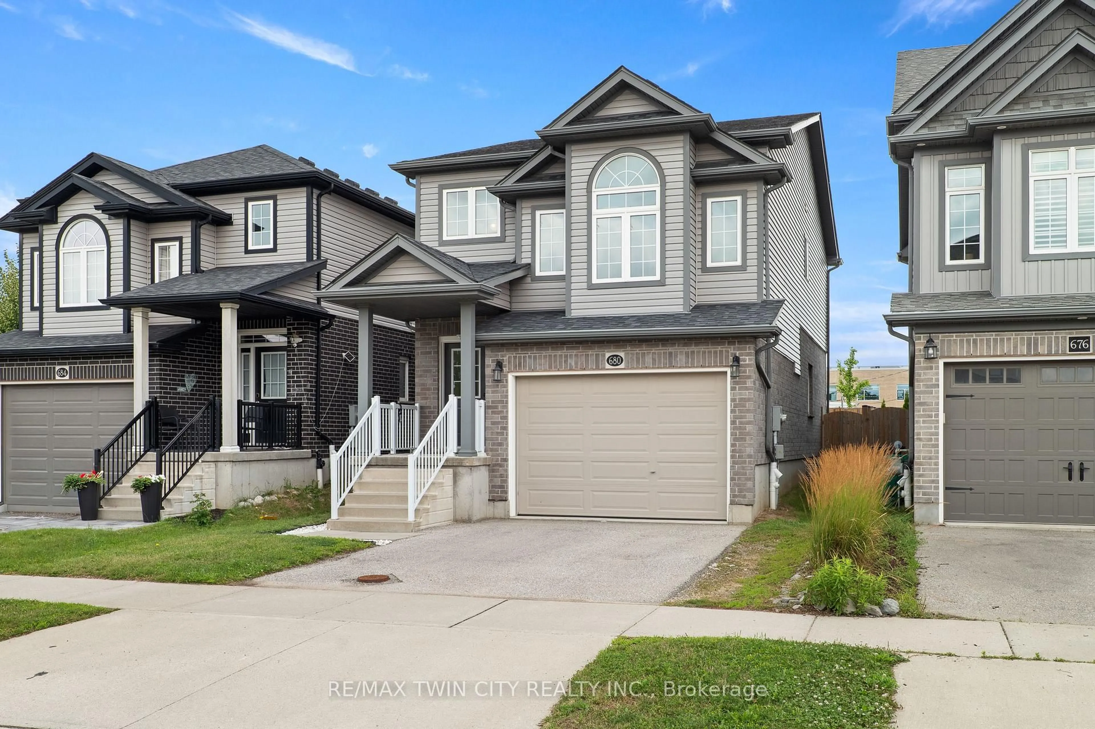 Home with vinyl exterior material, street for 680 Blair Creek Dr, Kitchener Ontario N2P 0E7