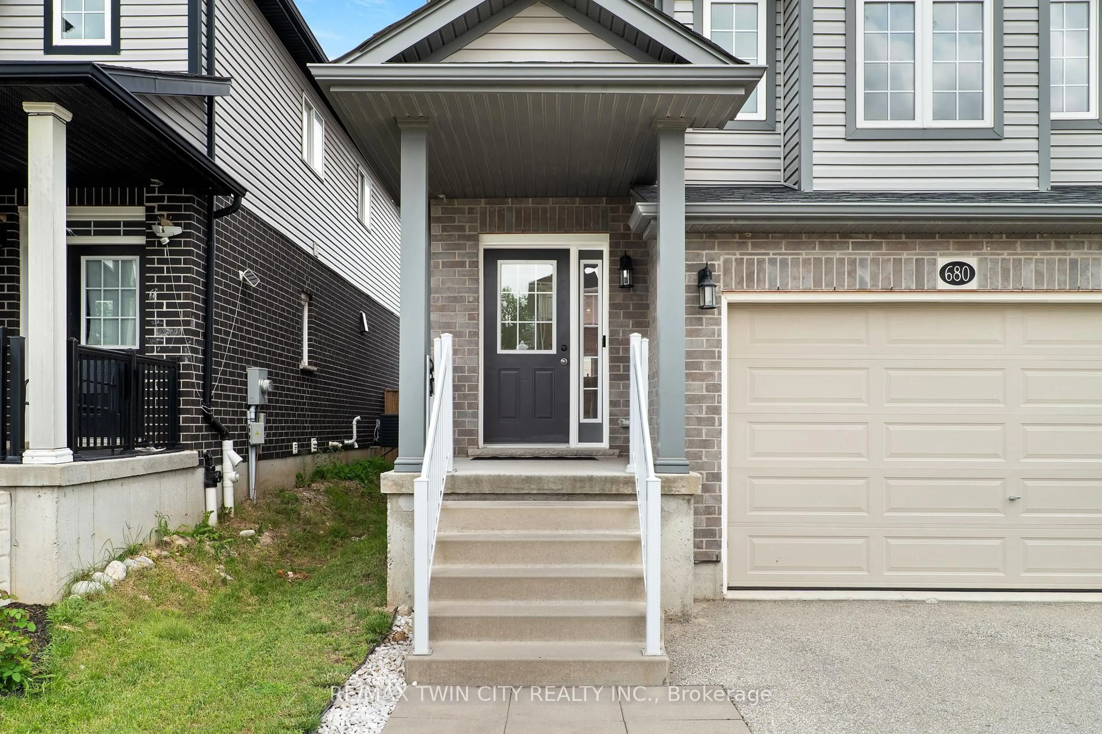 Home with vinyl exterior material, street for 680 Blair Creek Dr, Kitchener Ontario N2P 0E7