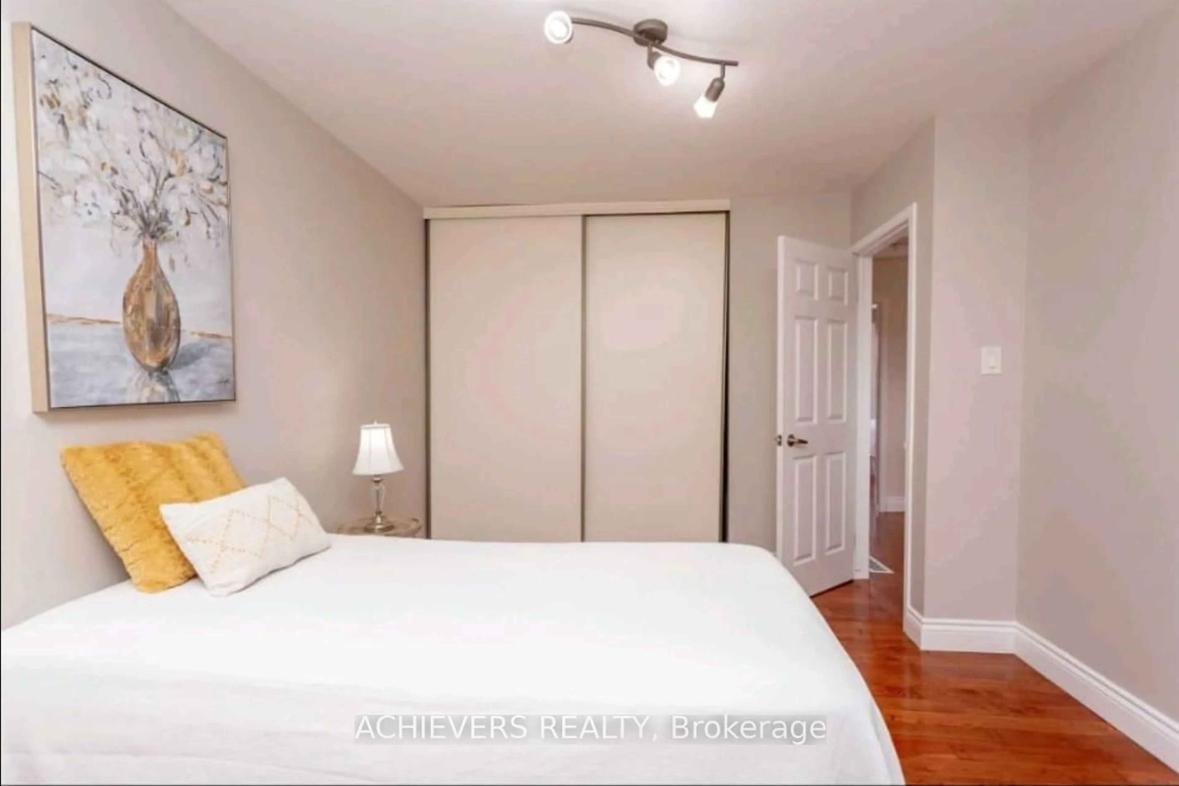 Bedroom with bed, wood/laminate floor for 770 Fanshawe Park Rd, London North Ontario N5X 1L5