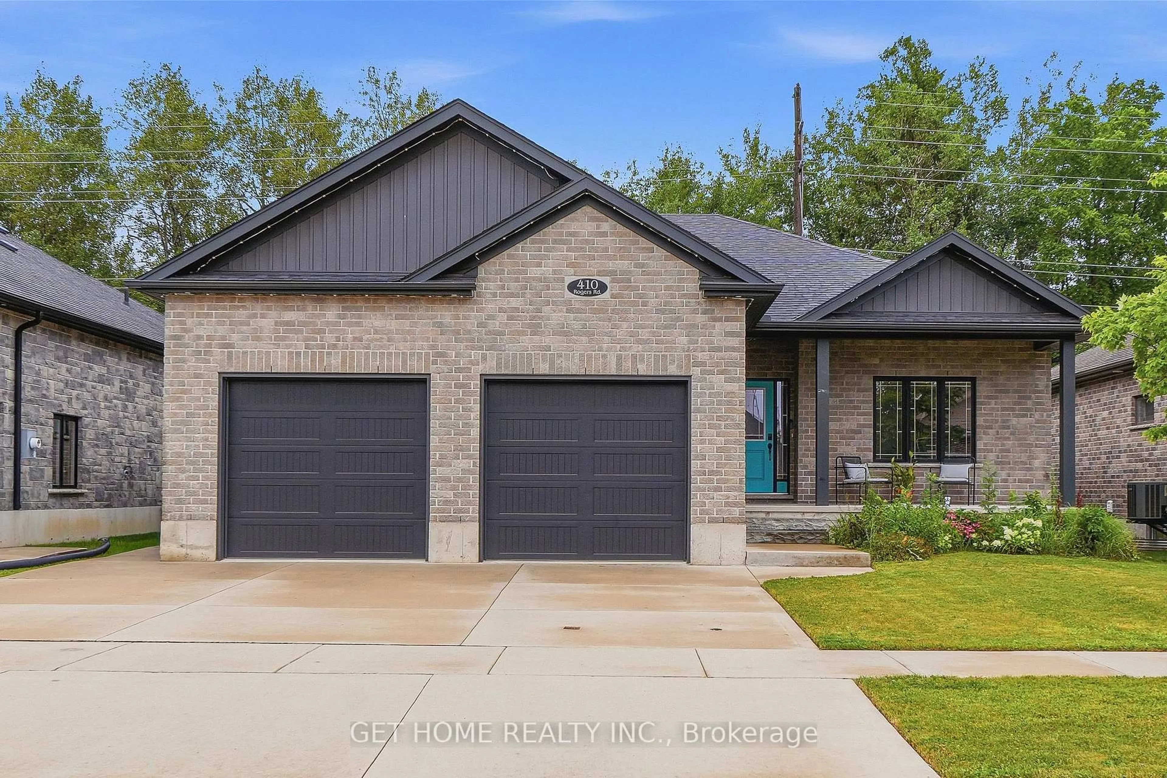 Home with brick exterior material, street for 410 Rogers Rd, North Perth Ontario N4W 0H2