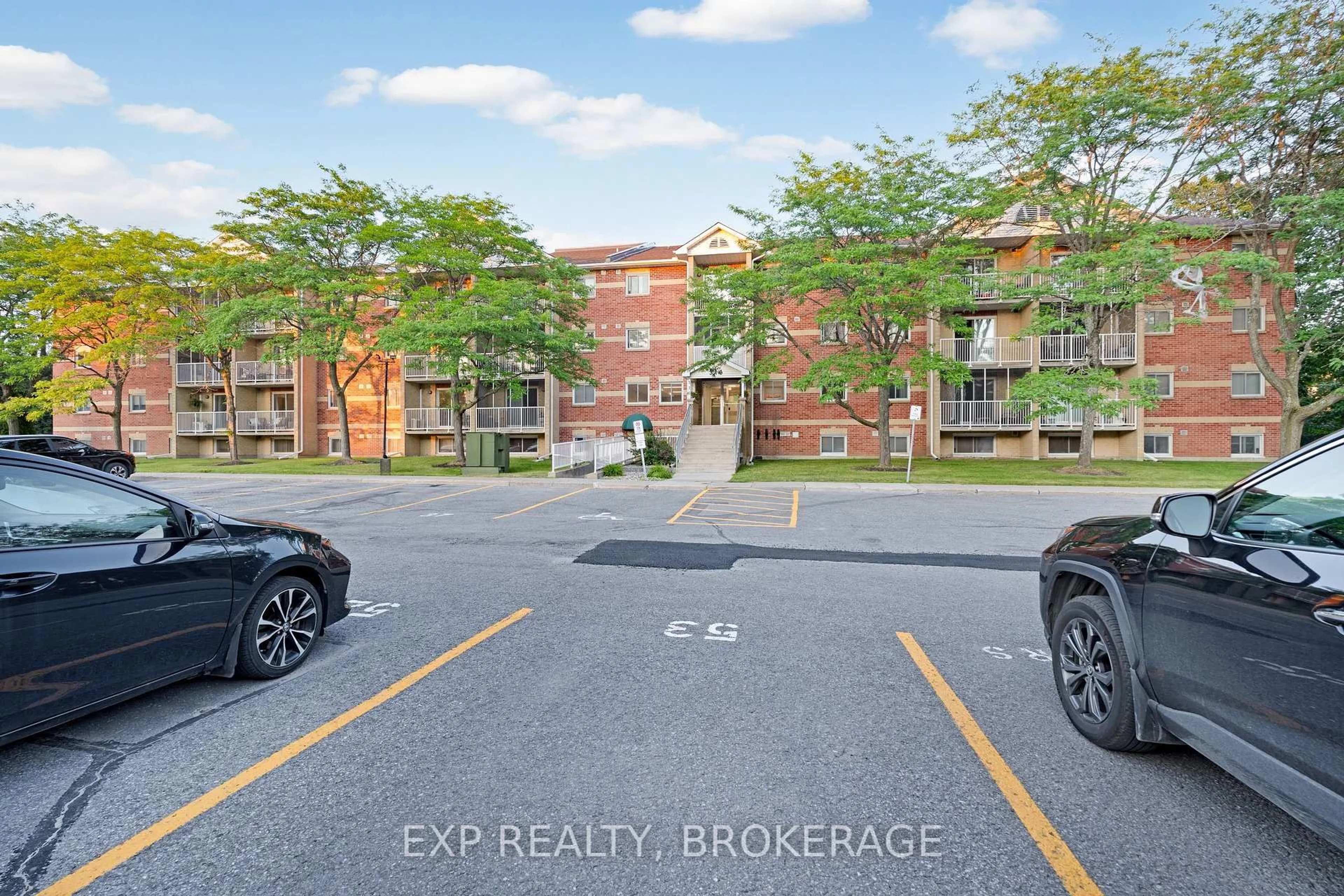 A pic from outside/outdoor area/front of a property/back of a property/a pic from drone, street for 316 Kingsdale Ave #101, Kingston Ontario K7M 8S2