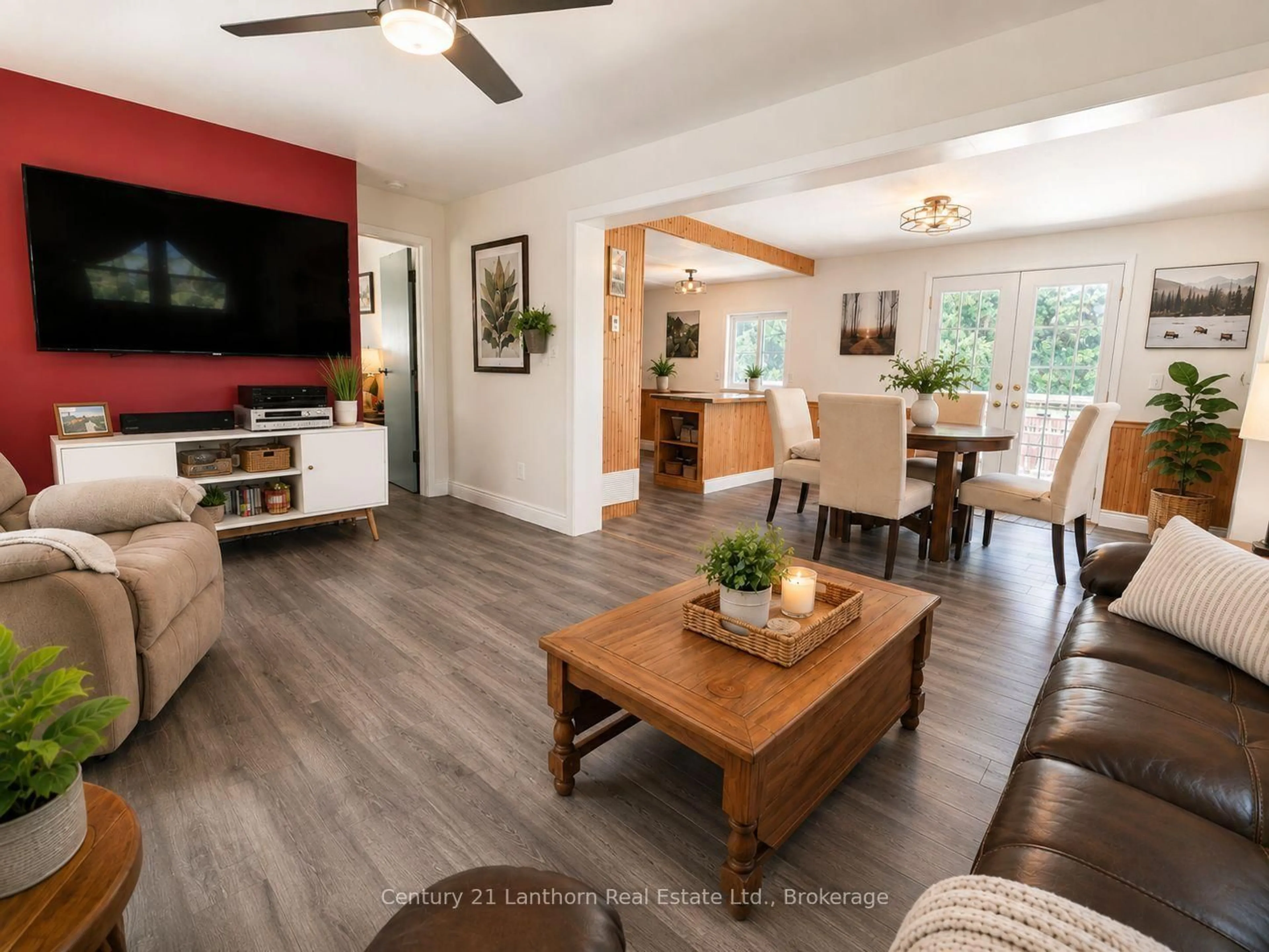 Living room with furniture, wood/laminate floor for 1113 Clark Rd, Frontenac Ontario K0H 0B6