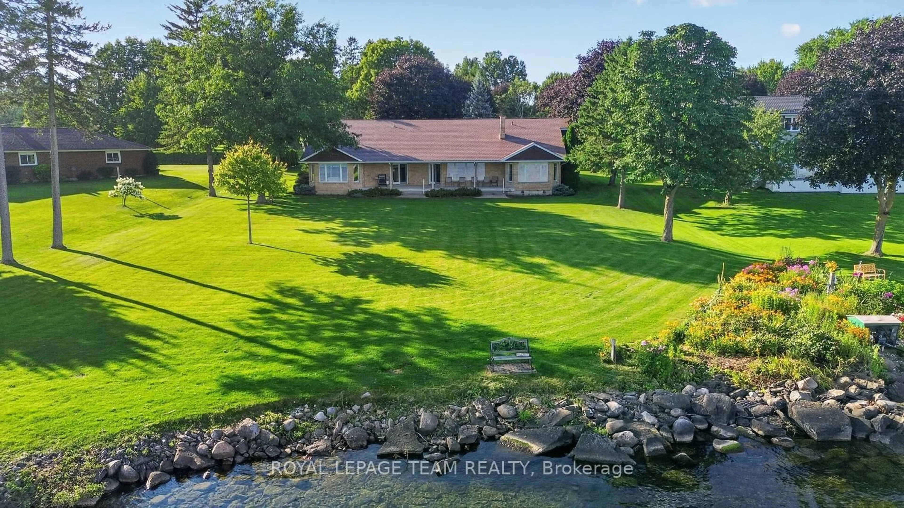 A pic from outside/outdoor area/front of a property/back of a property/a pic from drone, water/lake/river/ocean view for 1363 County 2 Rd, Augusta Ontario K0E 1T0