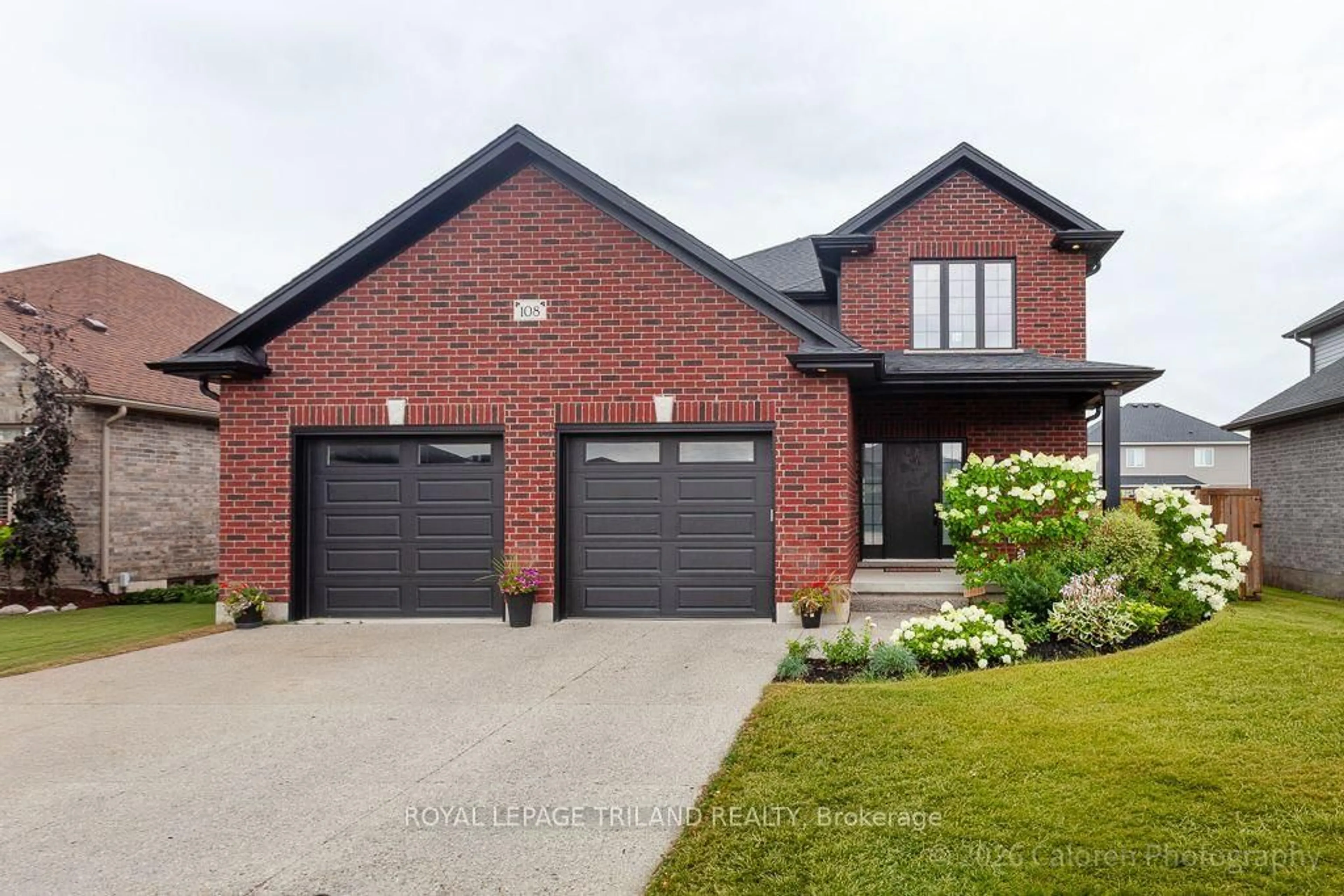 Home with brick exterior material, street for 108 Spencer Ave, Lucan Biddulph Ontario N0M 2J0