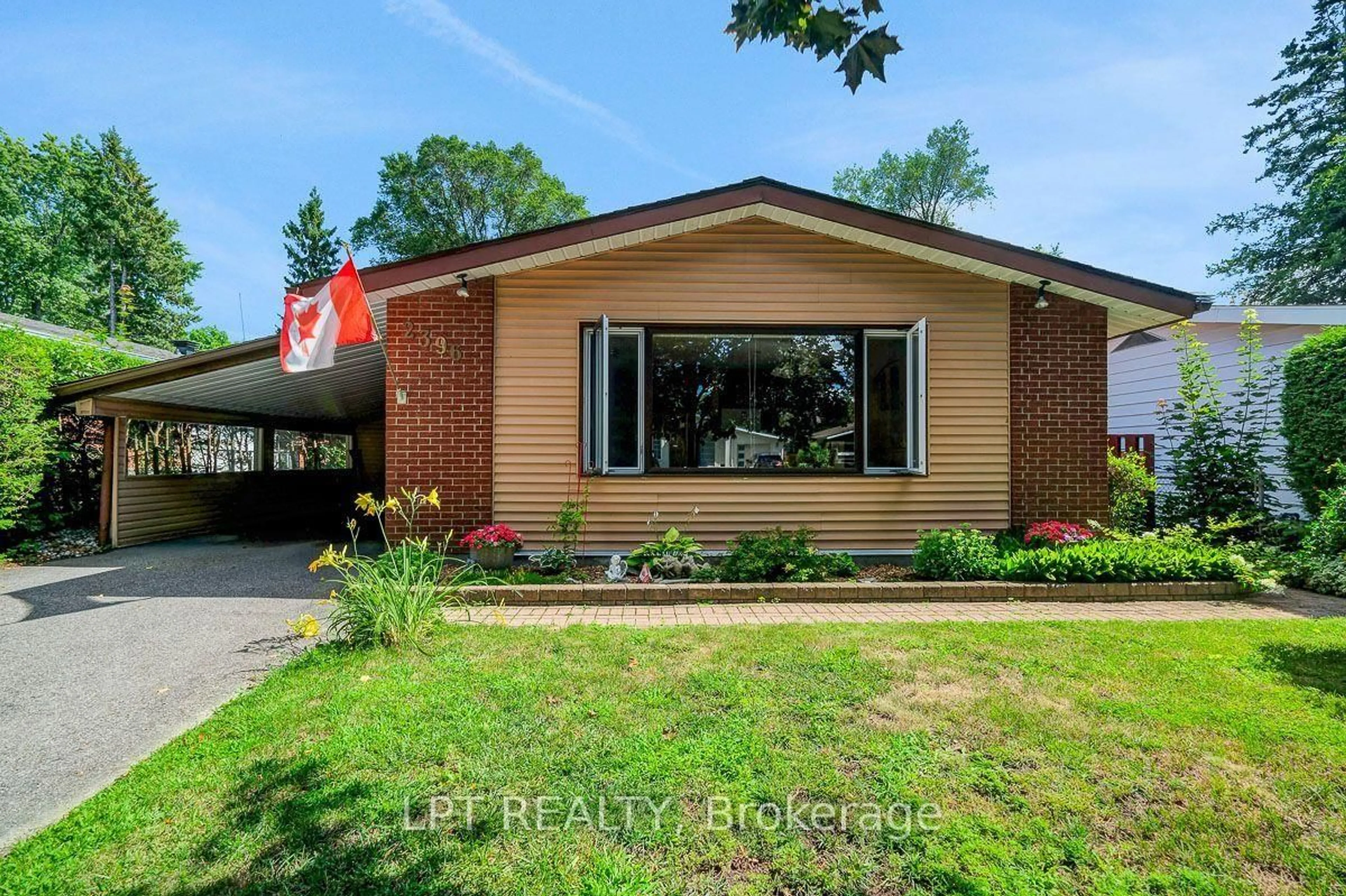 Home with brick exterior material, street for 2396 Heaton Ave, Ottawa Ontario K1G 1J2