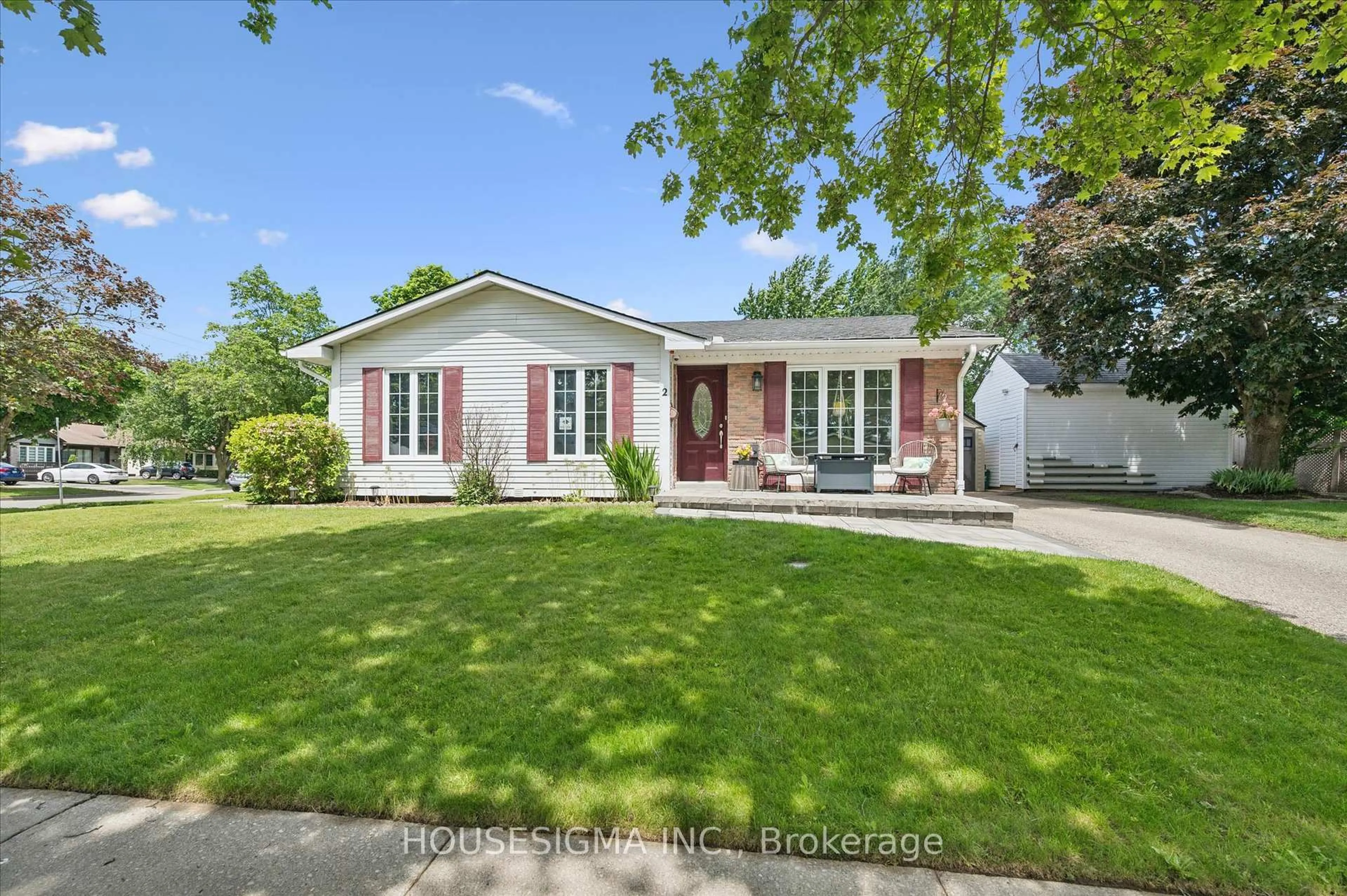 Home with brick exterior material, street for 2 Keewatin Ave, Kitchener Ontario N2B 3L5
