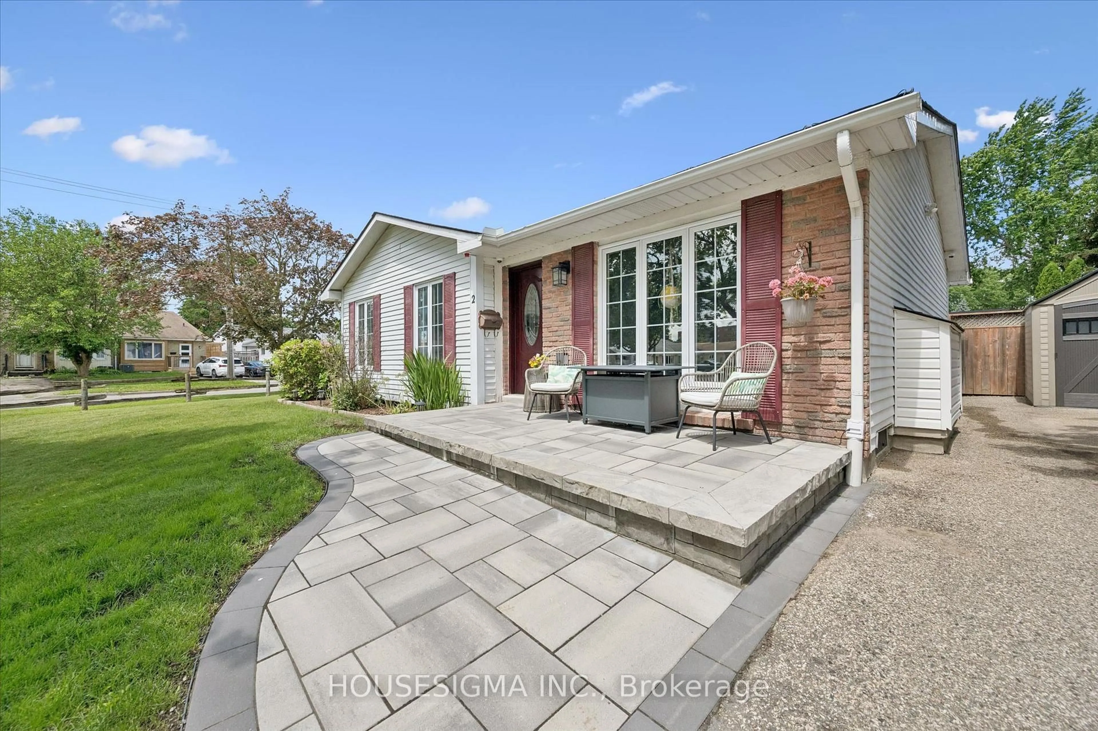 Home with brick exterior material, street for 2 Keewatin Ave, Kitchener Ontario N2B 3L5