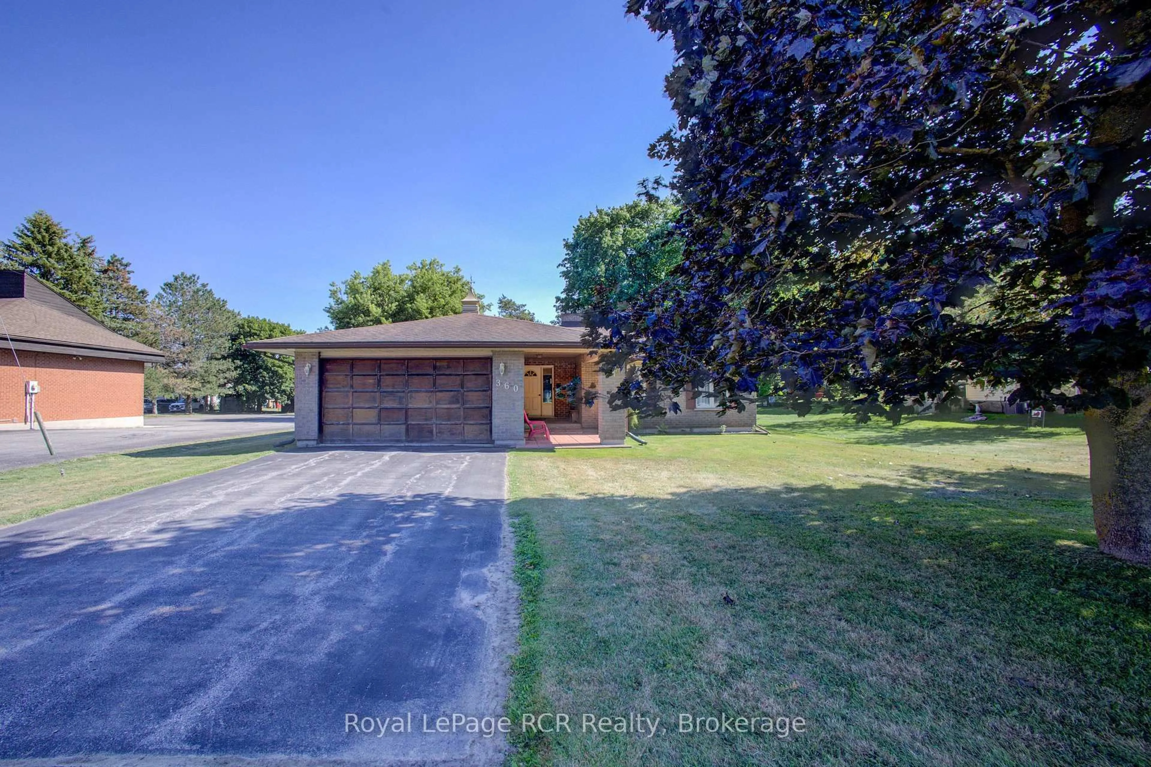 A pic from outside/outdoor area/front of a property/back of a property/a pic from drone, street for 360 Main St, Minto Ontario N0G 2P0