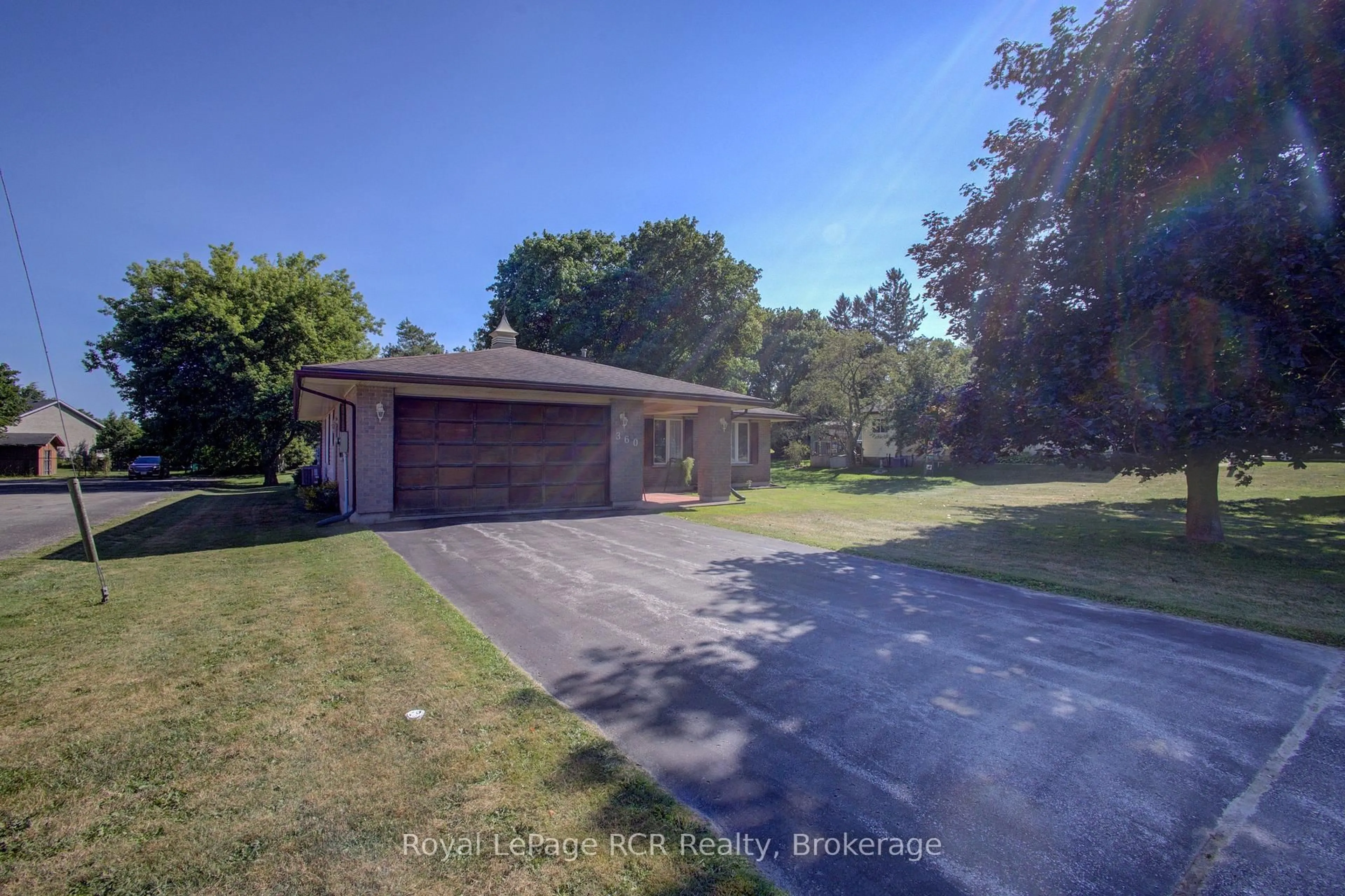 A pic from outside/outdoor area/front of a property/back of a property/a pic from drone, water/lake/river/ocean view for 360 Main St, Minto Ontario N0G 2P0