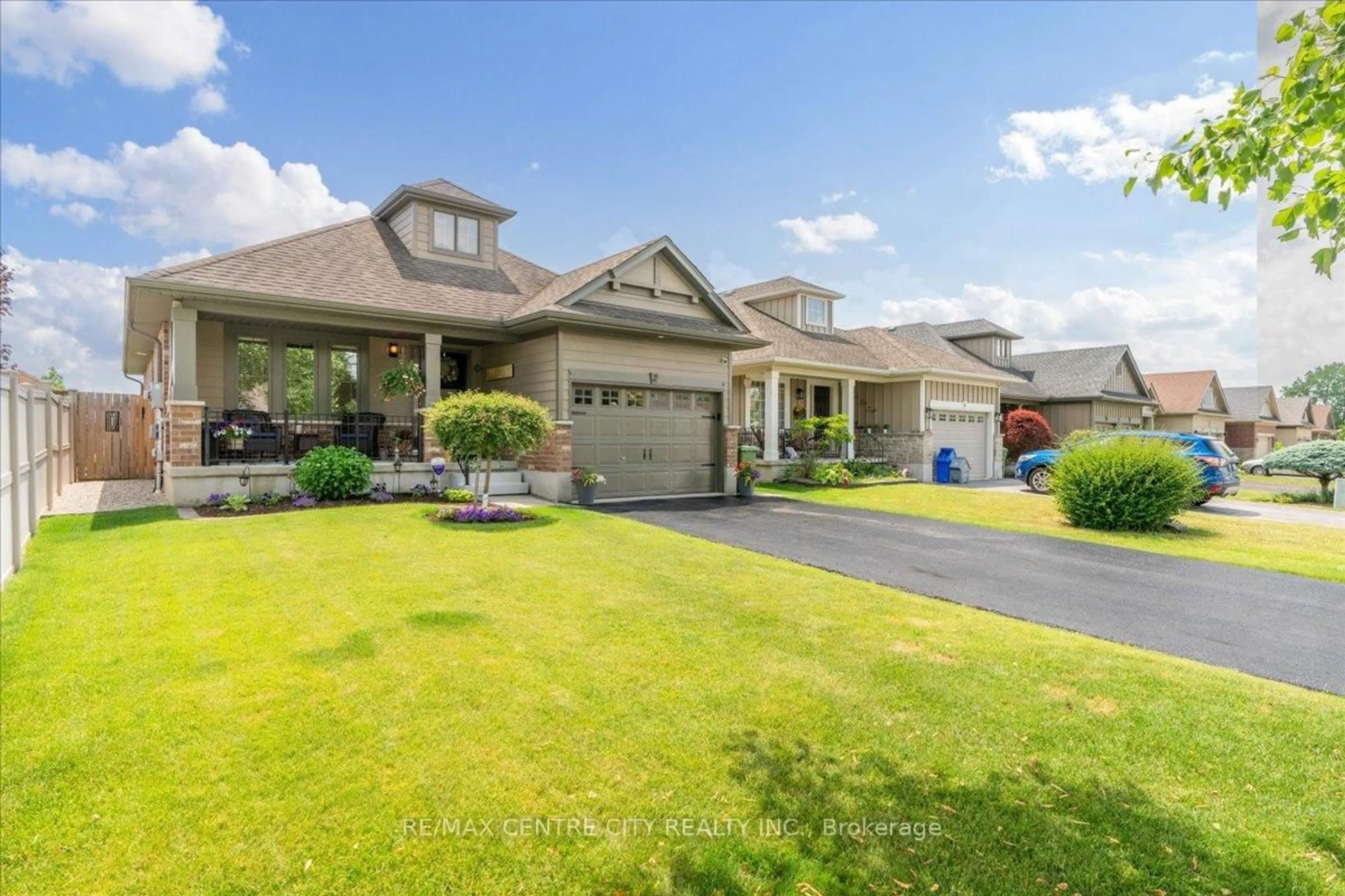Home with vinyl exterior material, street for 2 Cherry Blossom Lane, St. Thomas Ontario N5R 1L2