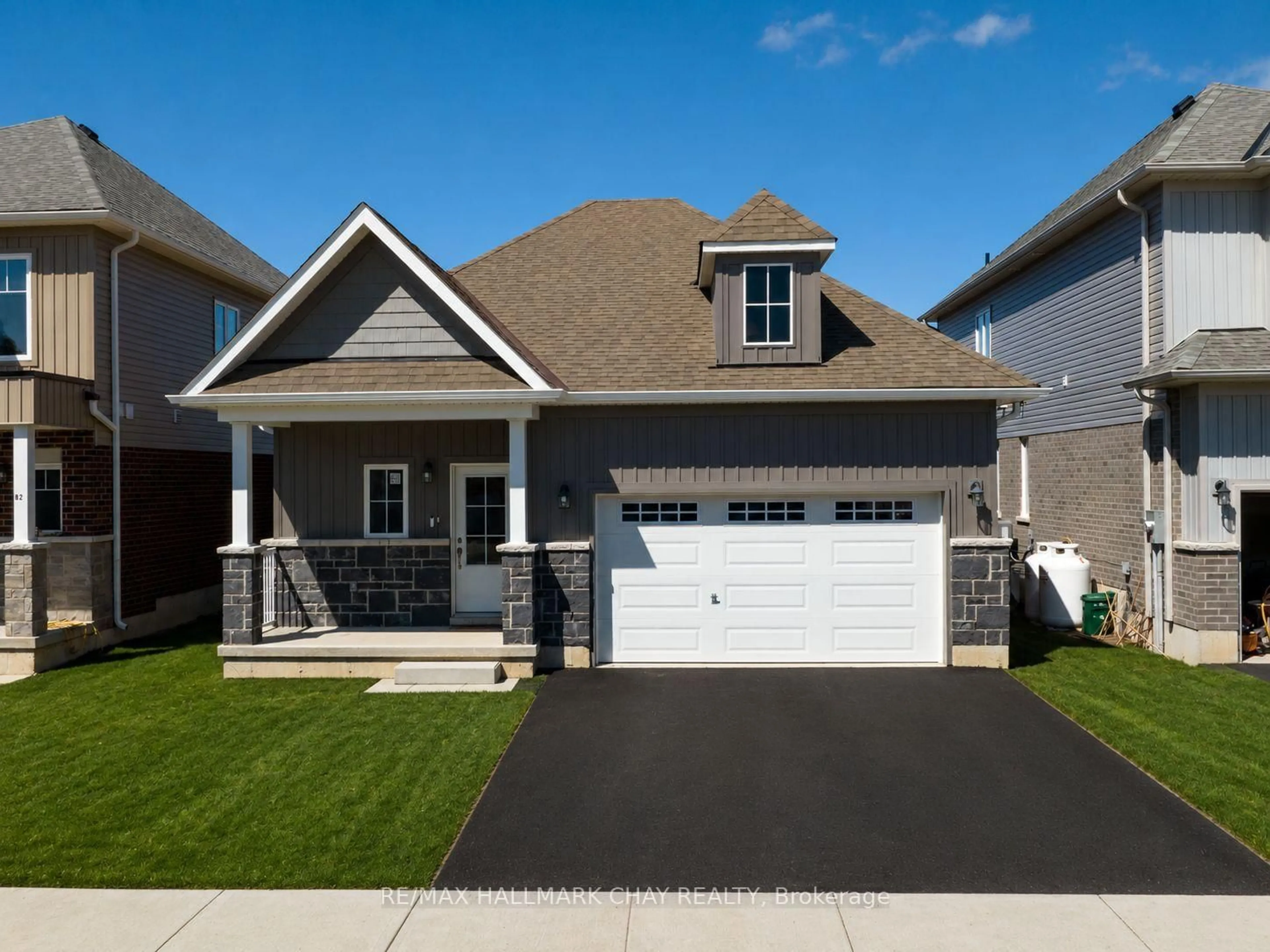 Home with vinyl exterior material, street for 64 Hillcroft Way, Kawartha Lakes Ontario K0M 1A0