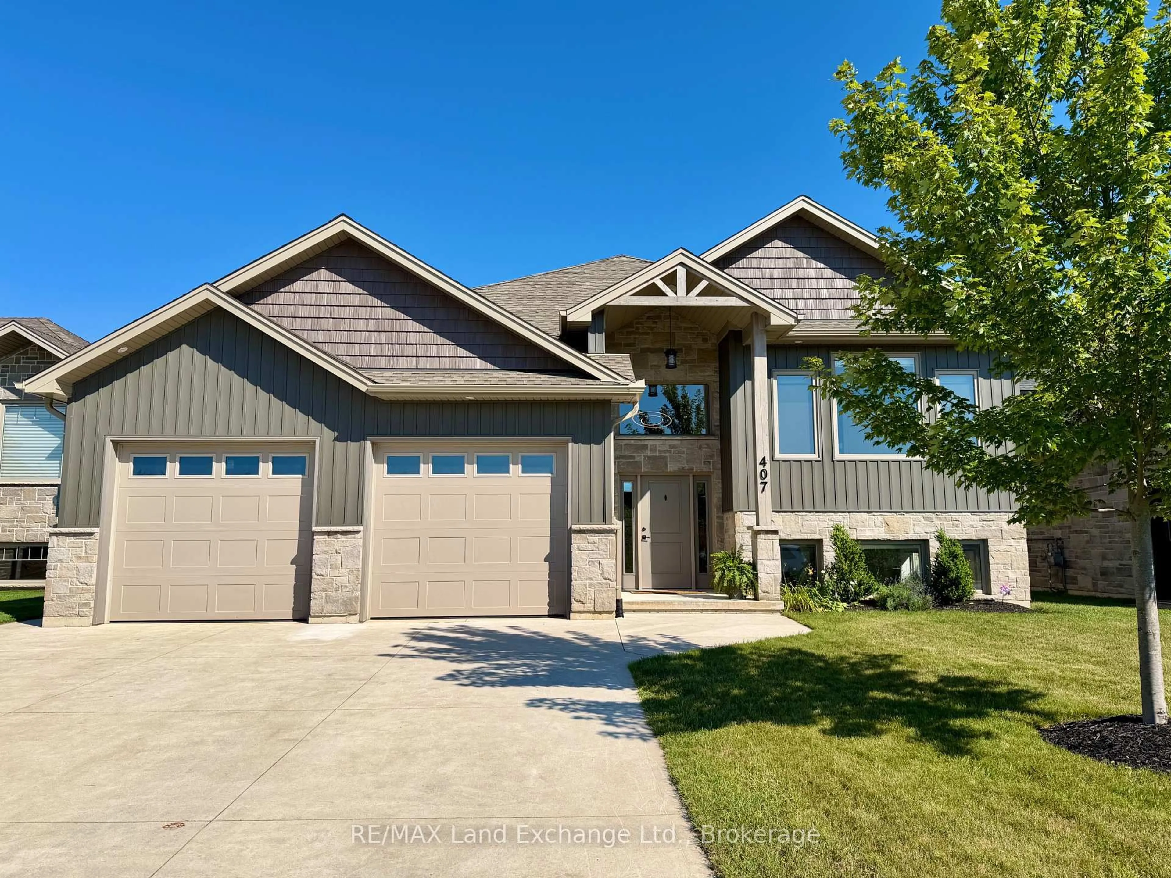 Home with brick exterior material, street for 407 Ridge St, Saugeen Shores Ontario N0H 2C3