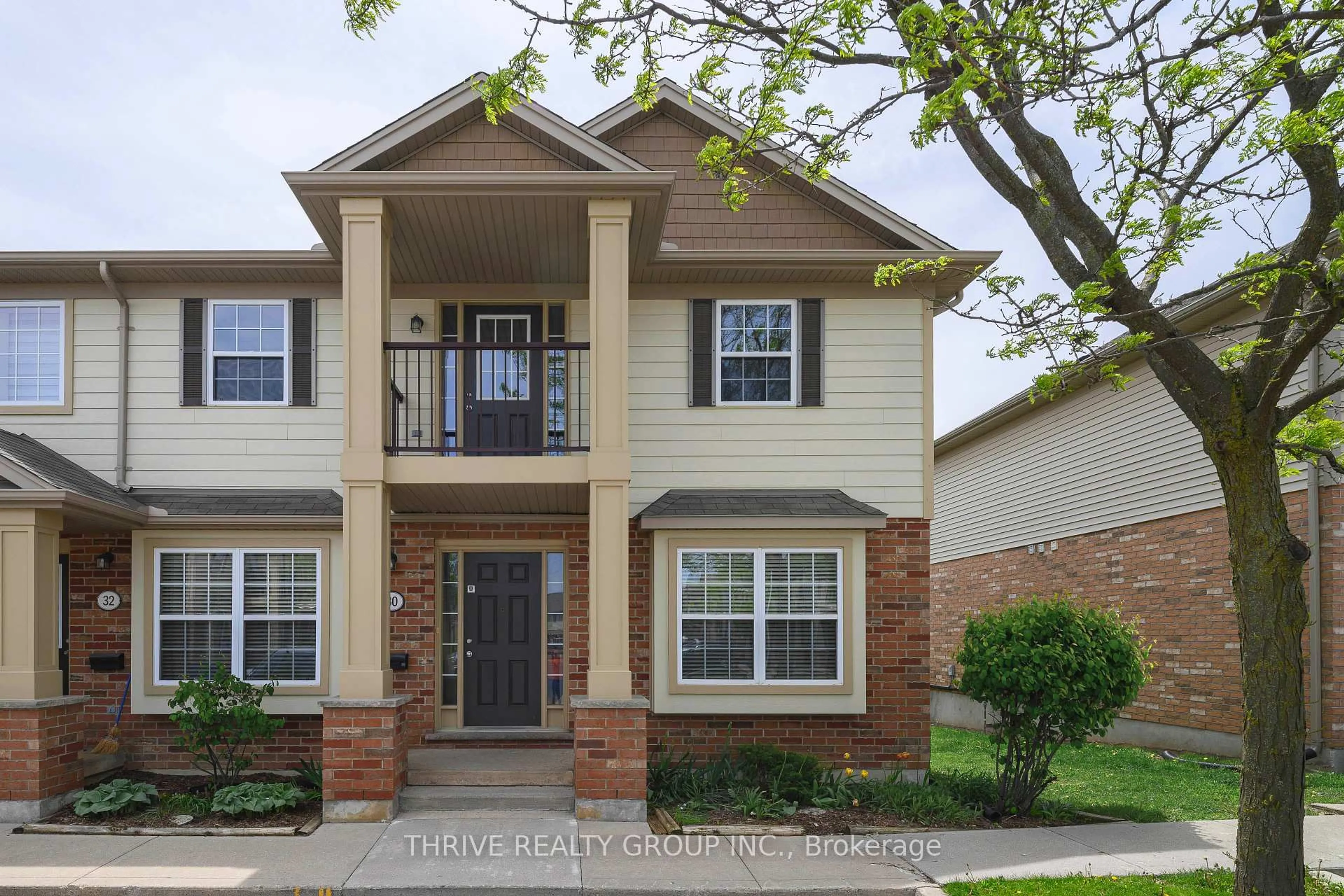 Home with brick exterior material, street for 3320 Meadowgate Blvd #30, London South Ontario N6M 0A7