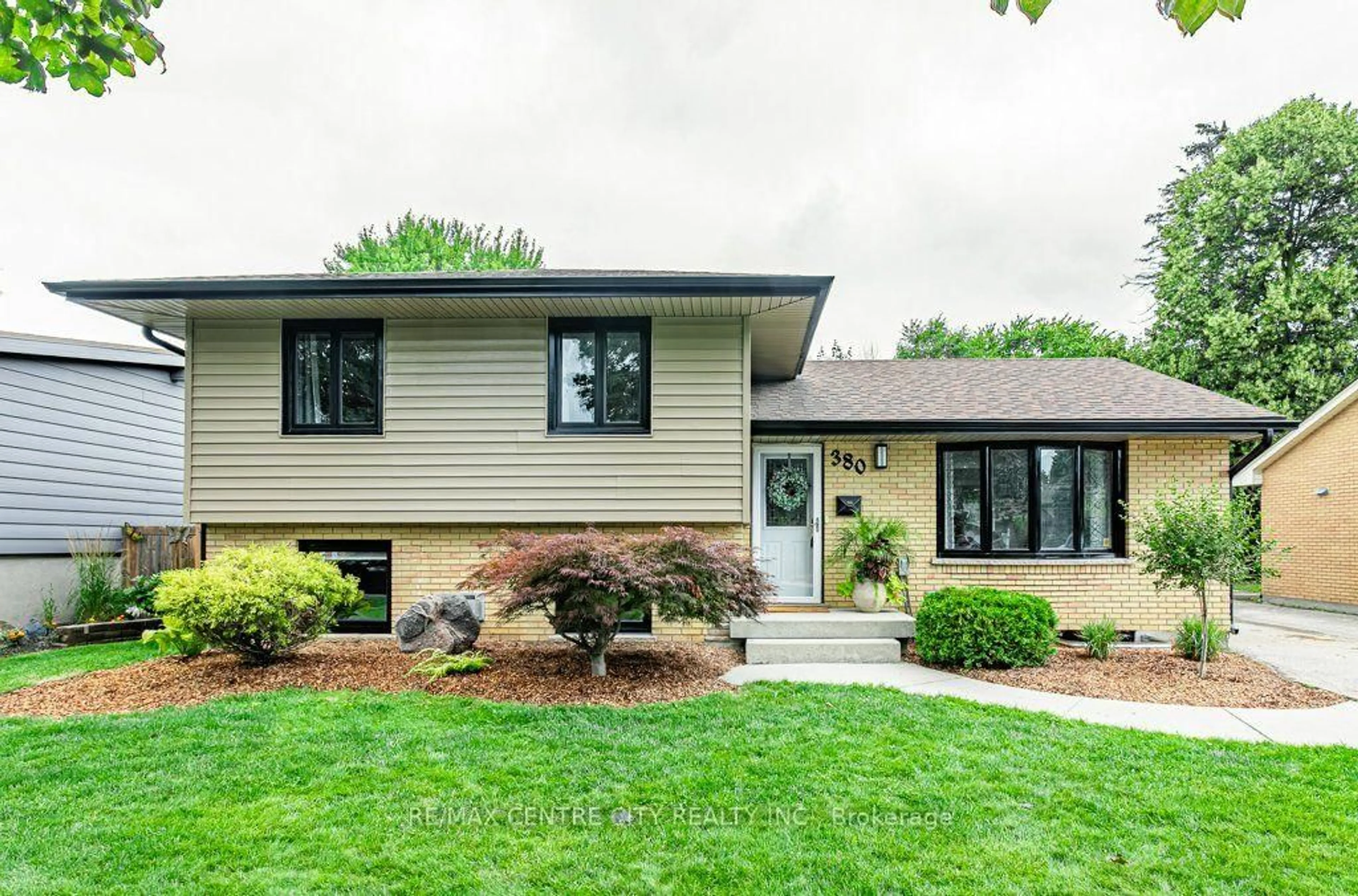 Home with vinyl exterior material, street for 380 Magnolia Cres, London East Ontario N5Y 4S9